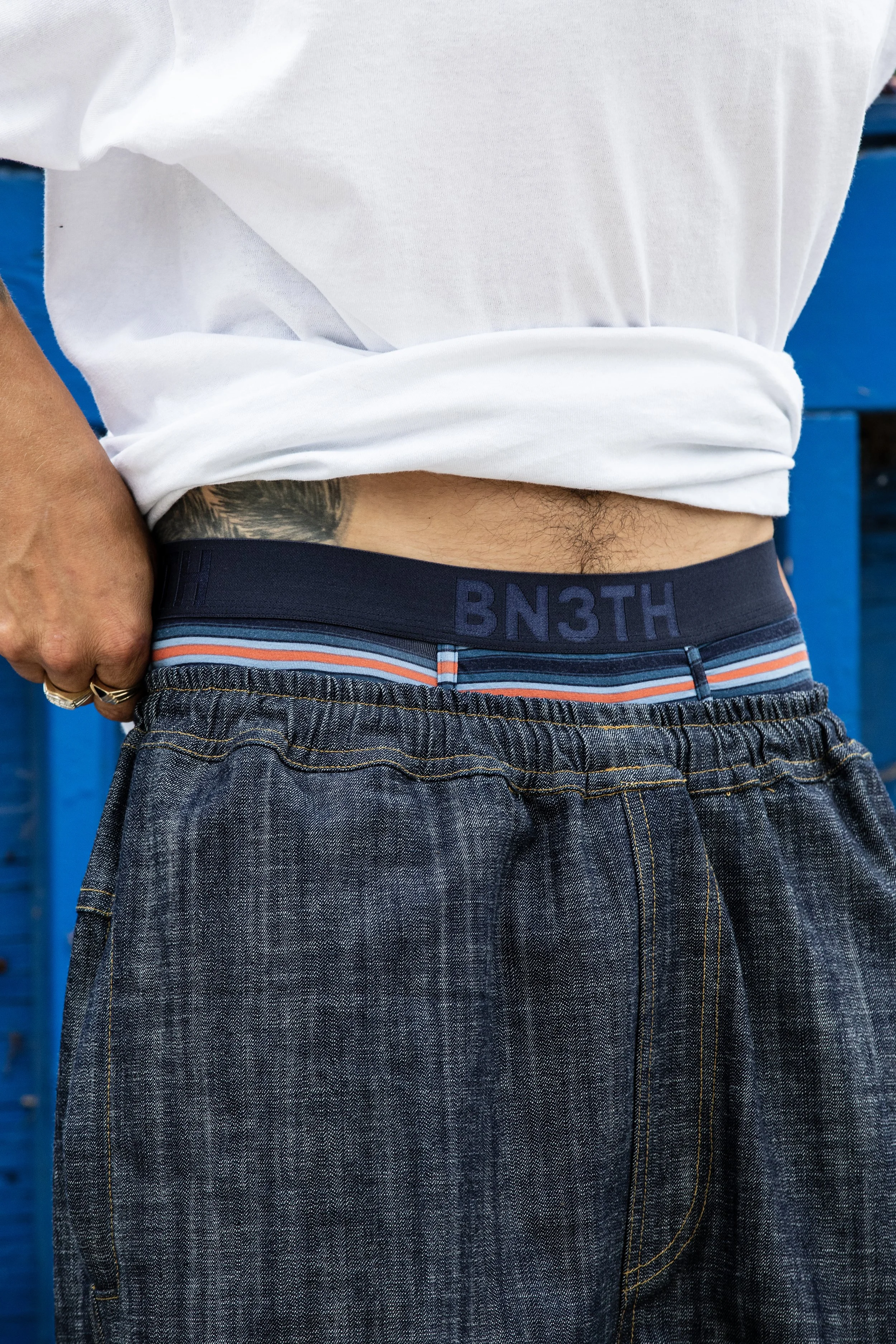 TJ wearing stripe boxers product photo 1.jpg
