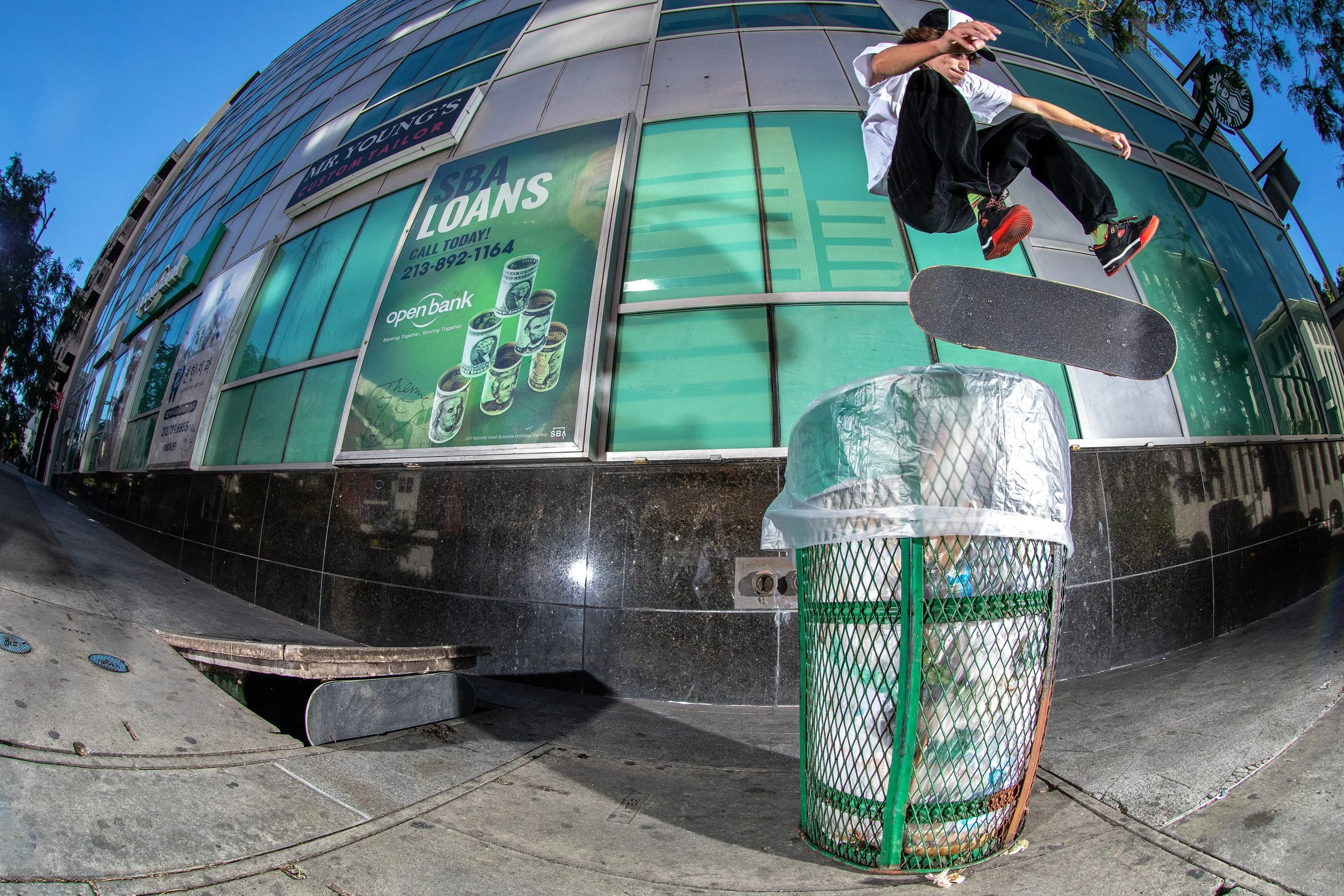 Ray kickflip over trashcan.jpg
