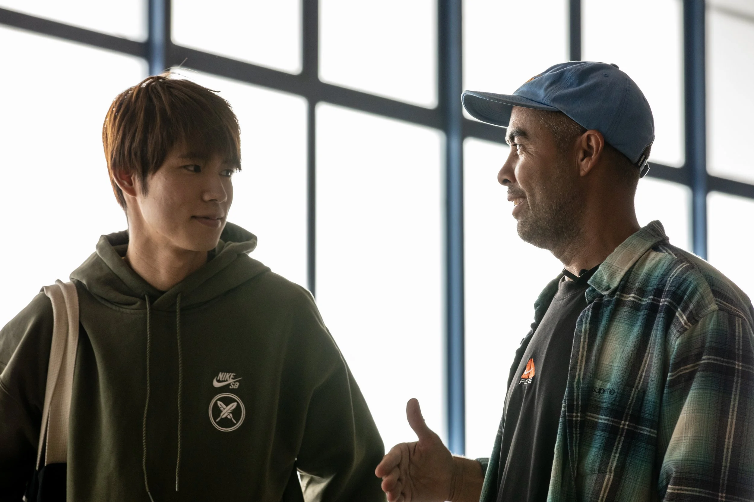 Koston talking to Yuto before contest 3.JPG