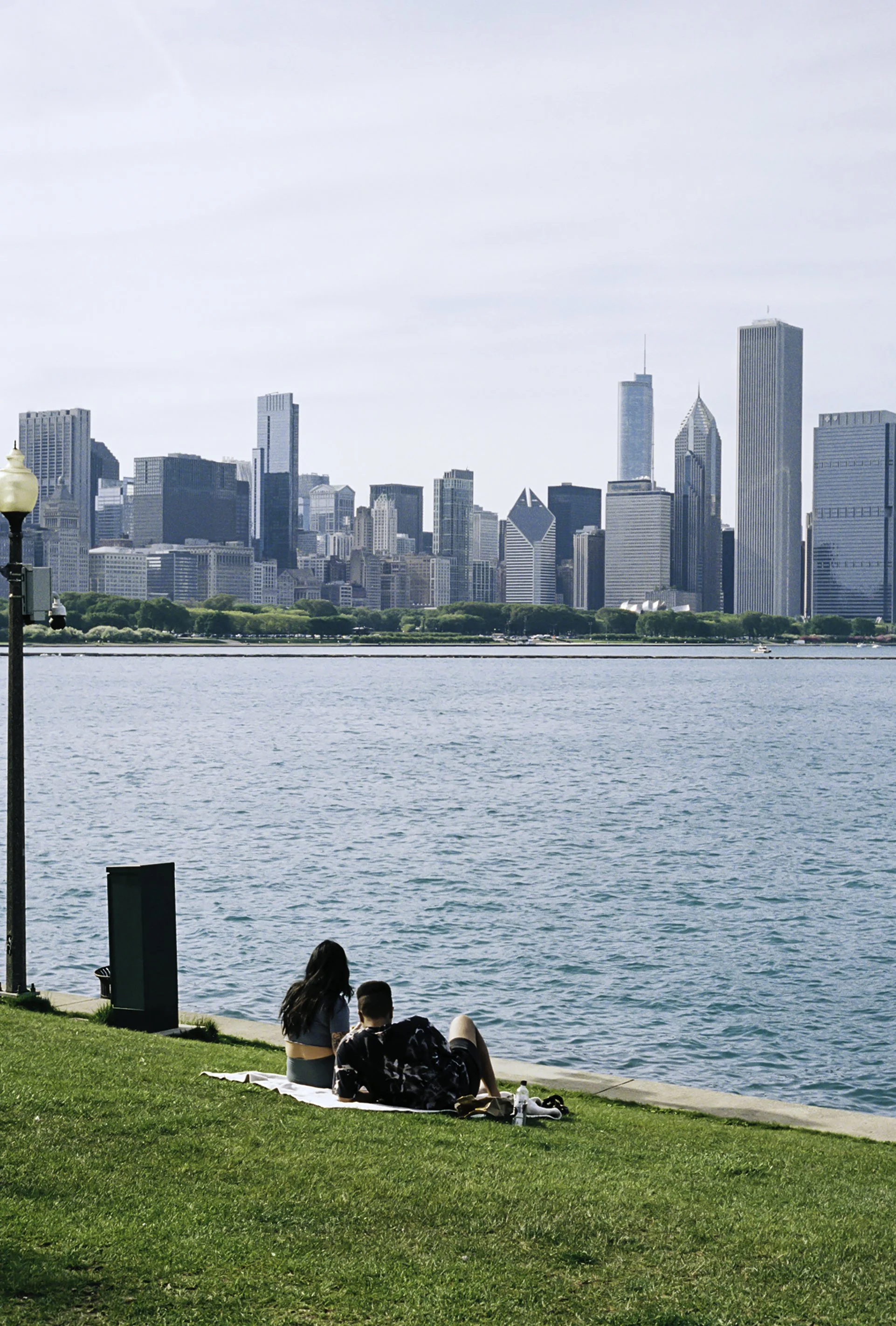 Couple sitting in front of skyline.JPG