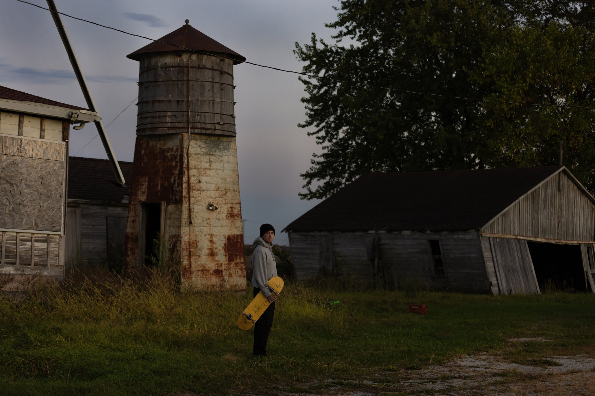 Tyler portrait in middle of abandoned farm 1.JPG