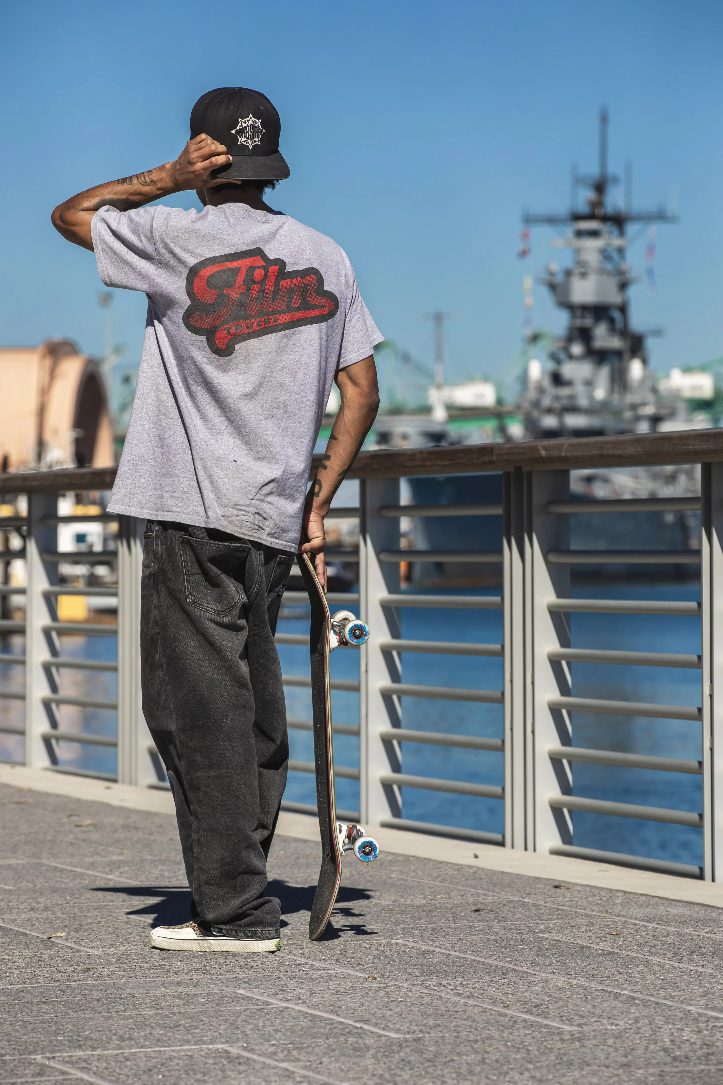 Bastien waiting to skate spot bts 2.JPG