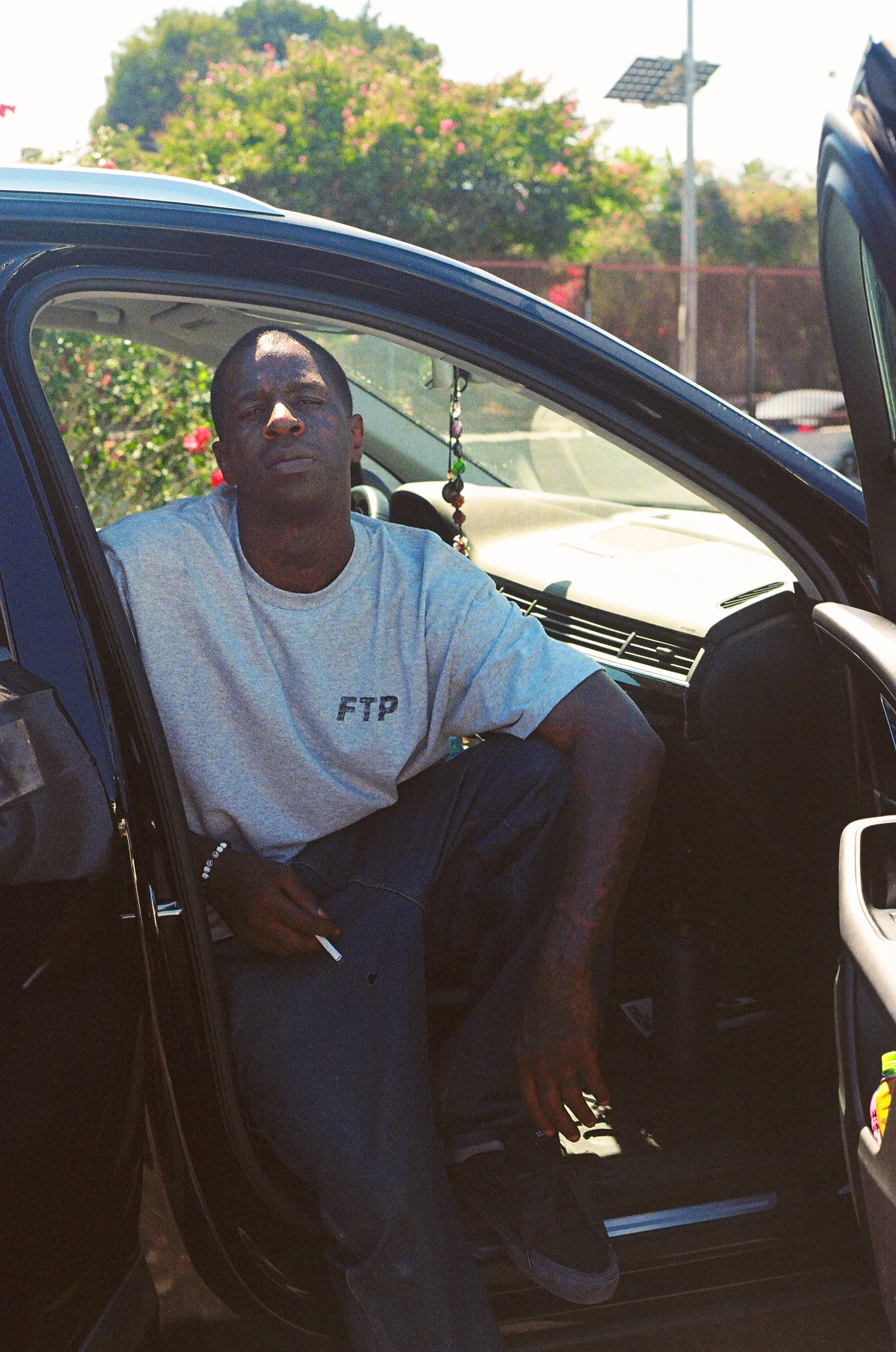 Antwuan sitting in car portrait.jpg