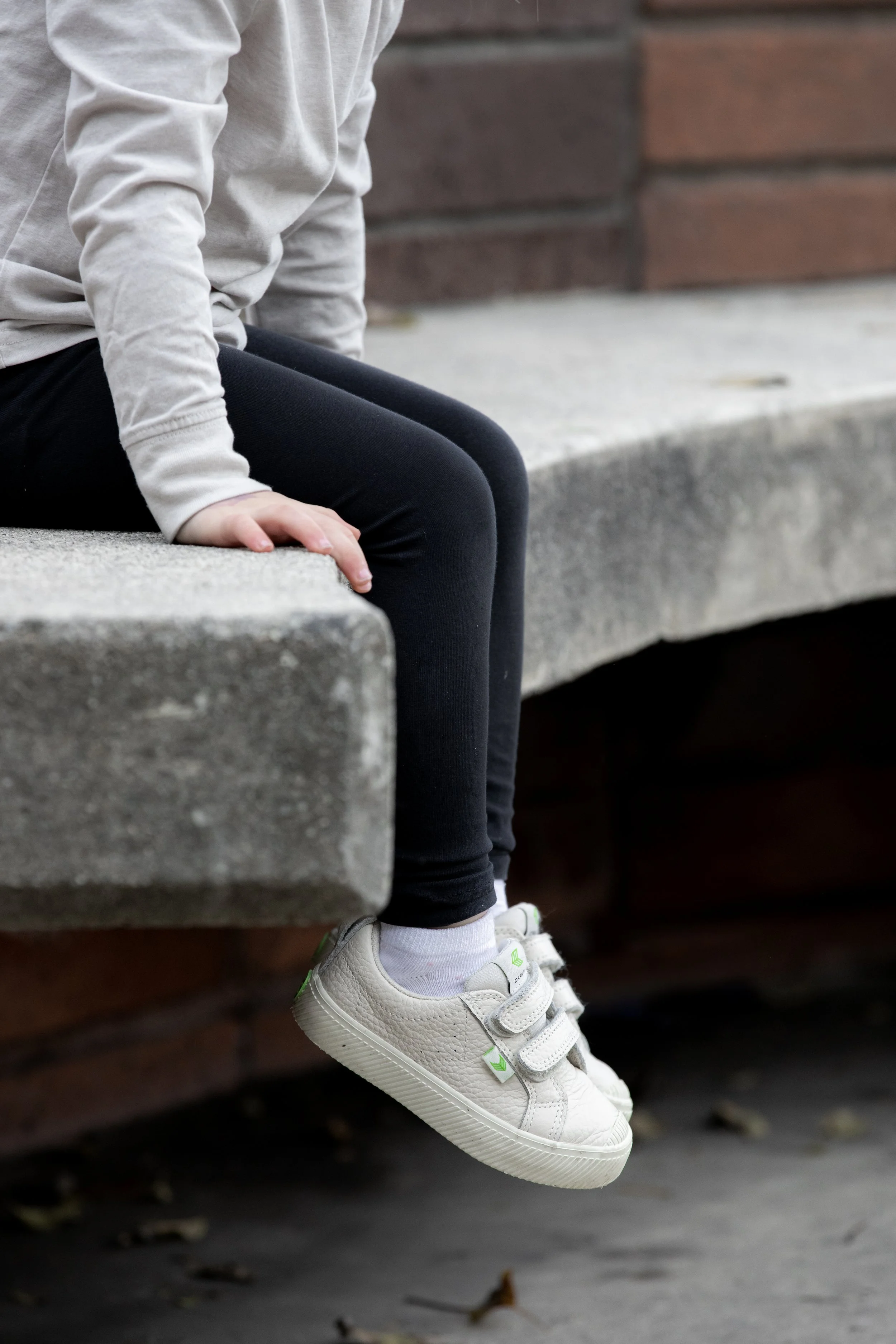 Emy wearing white oca leathers product photo 1.JPG