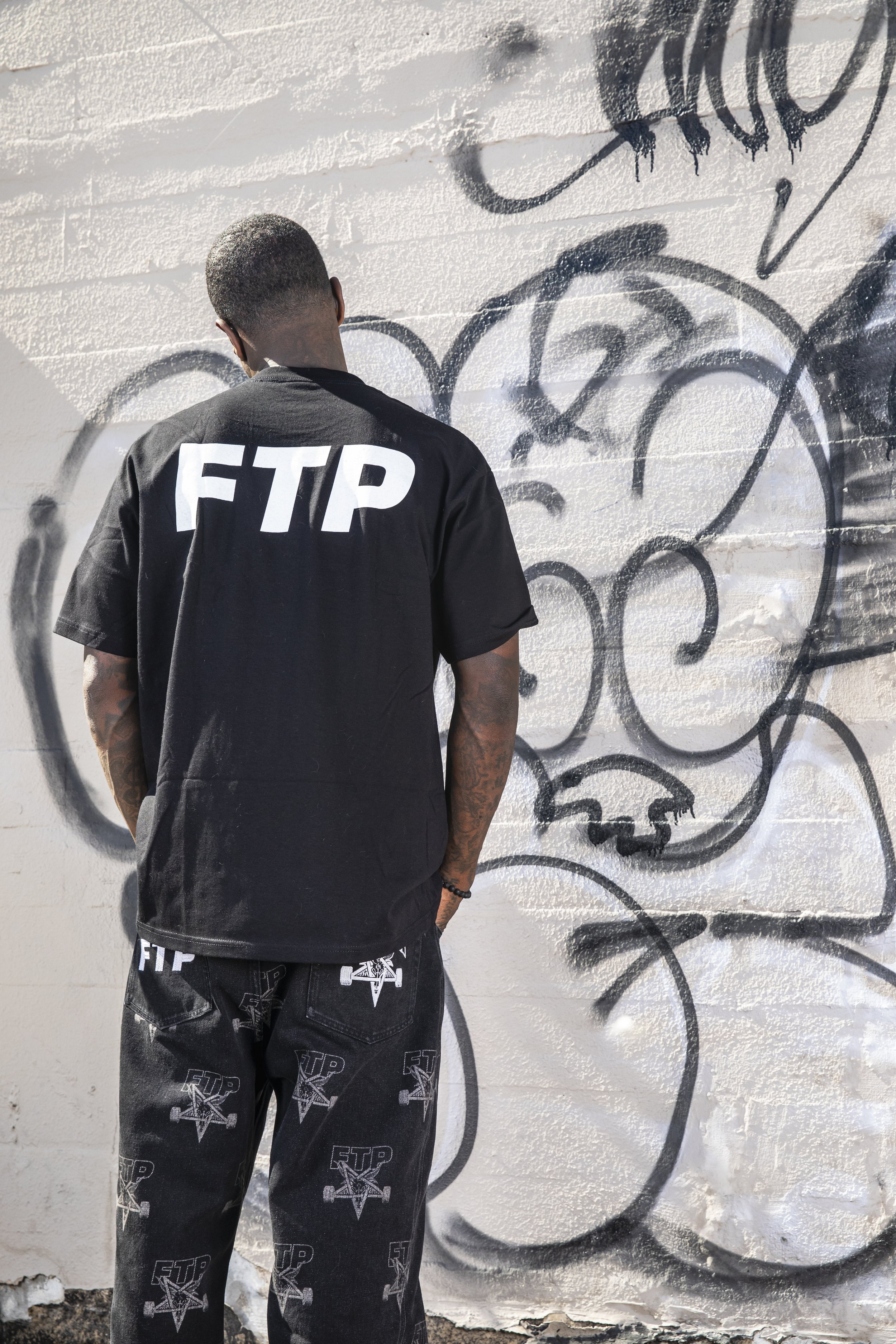 Antwuan in FTP X Thrasher Logo Tee 7.JPG
