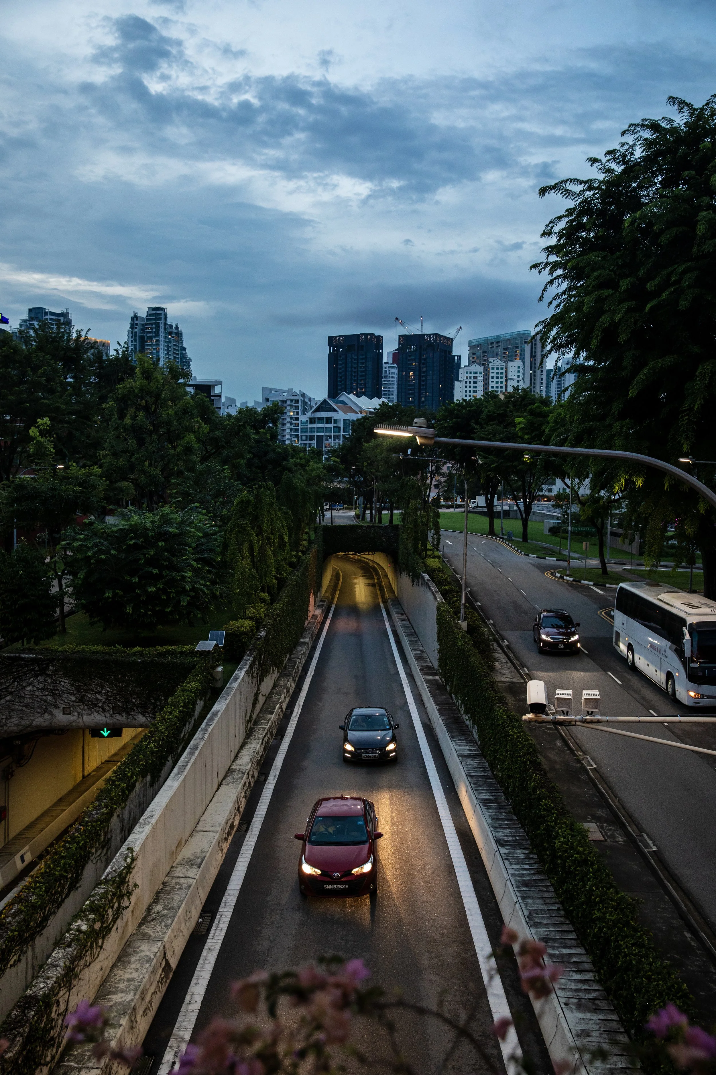 Cars driving into city.jpg