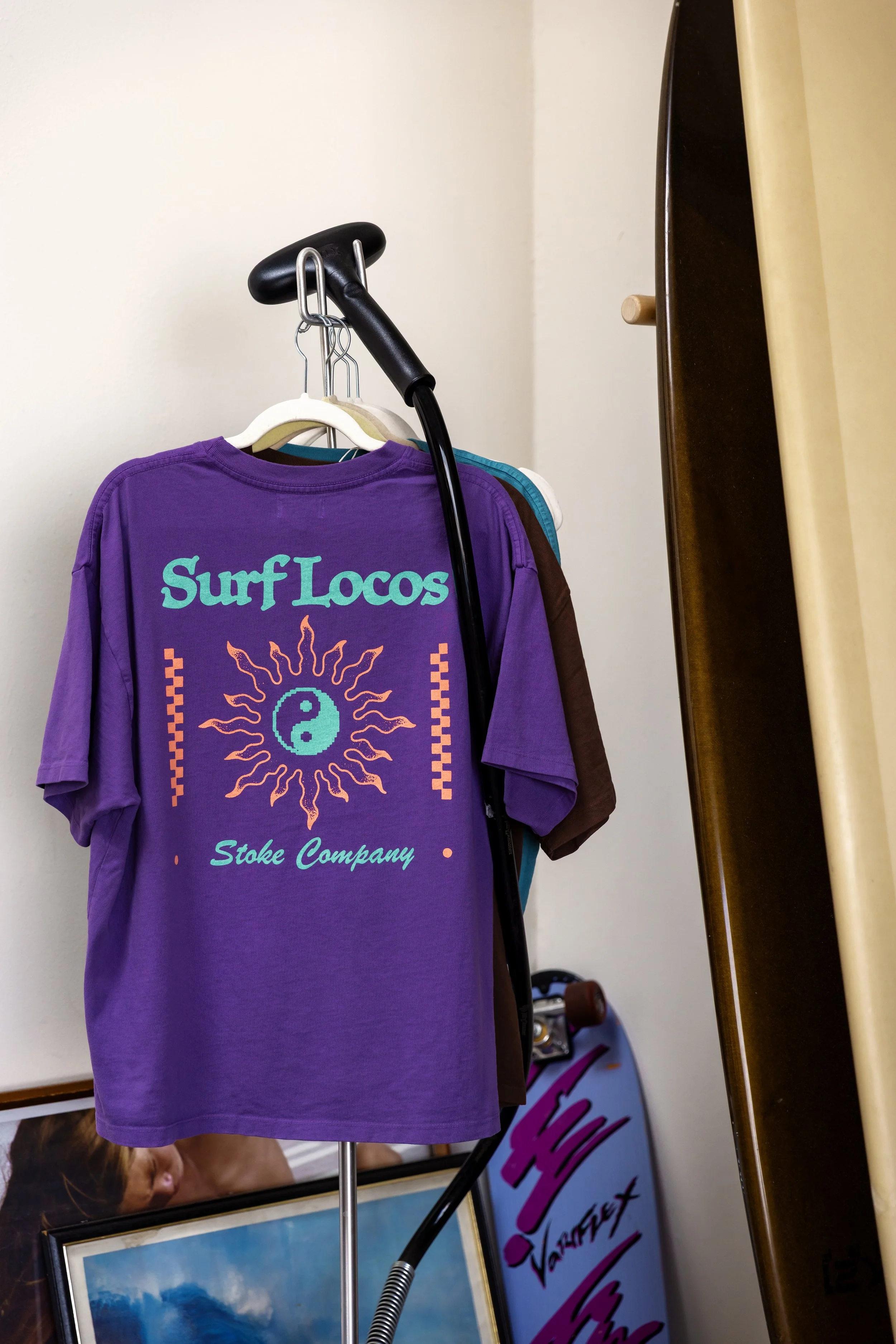 Shirts hanging on steamer in warehouse.jpg