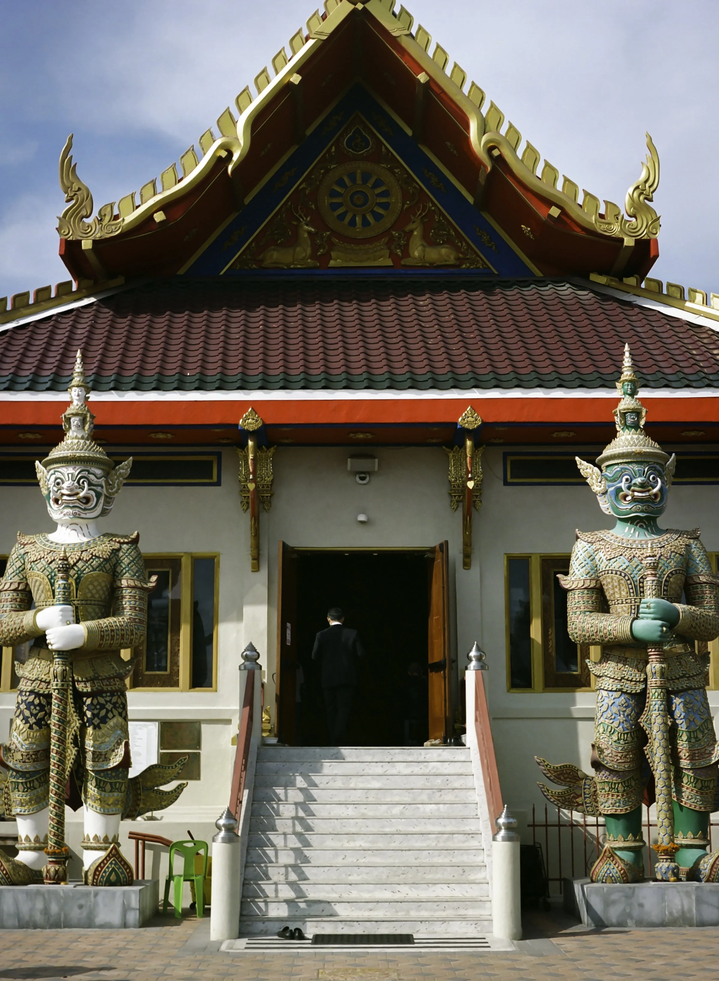 Man walking into temple.JPG