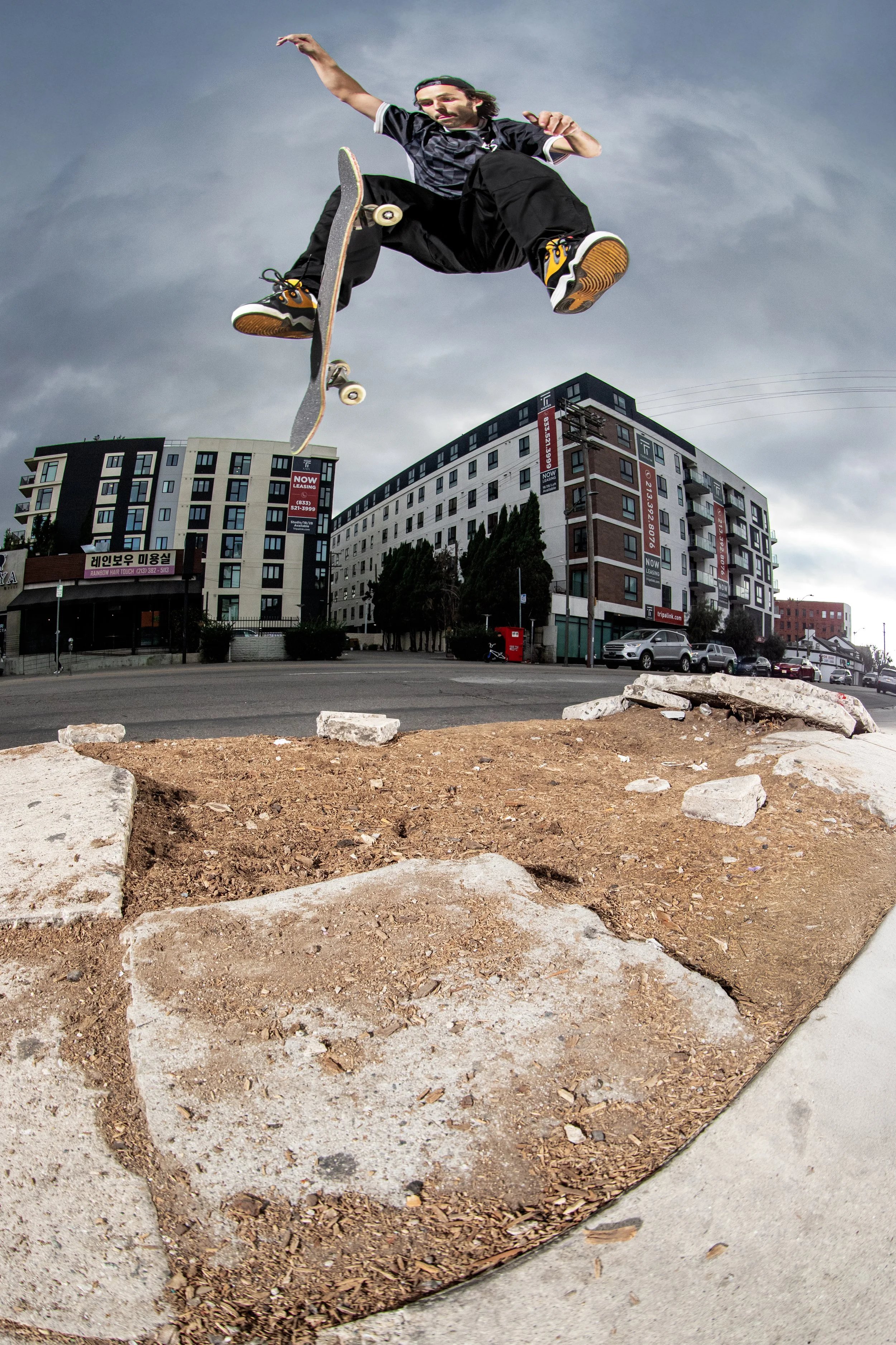 Mike tre flip bump over flat gap.JPG