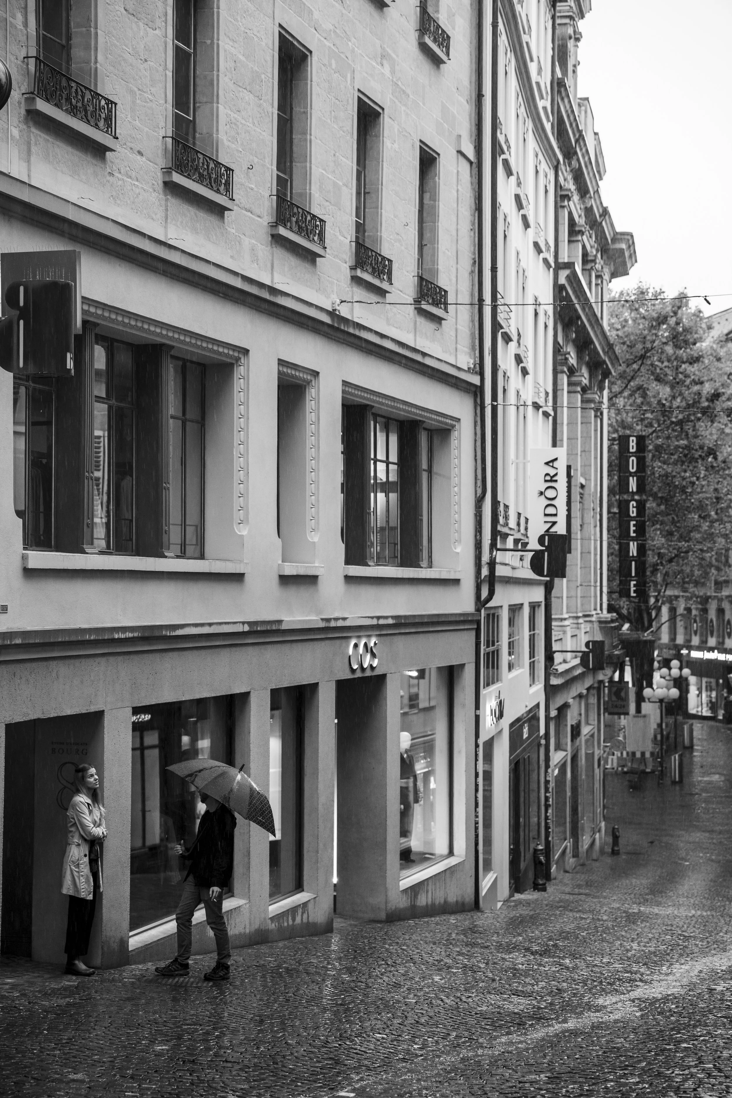 Couple talking in the rain.JPG