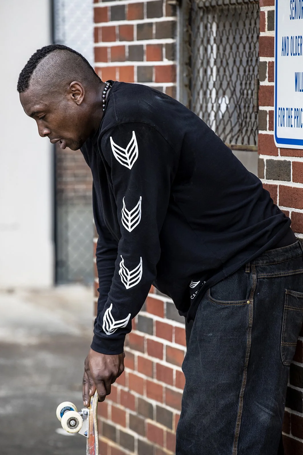 LeAndre waiting to skate spot bts 3.jpg