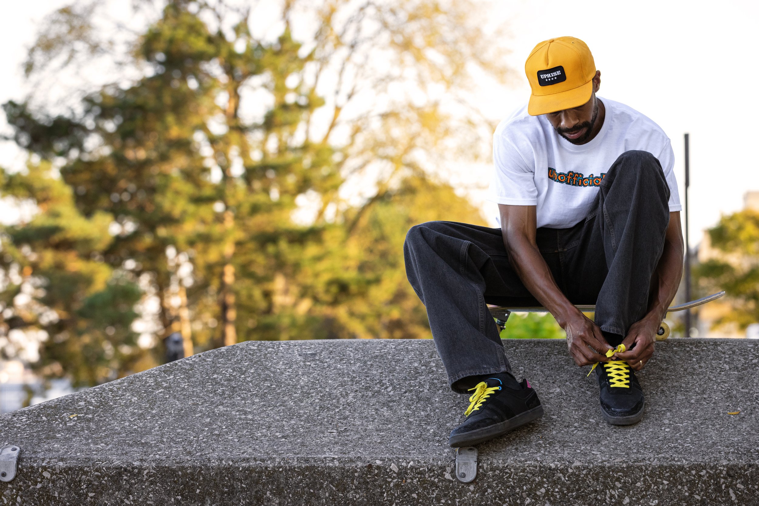 Timmy tying shoe on ledge at Pine Grove portrait.jpg