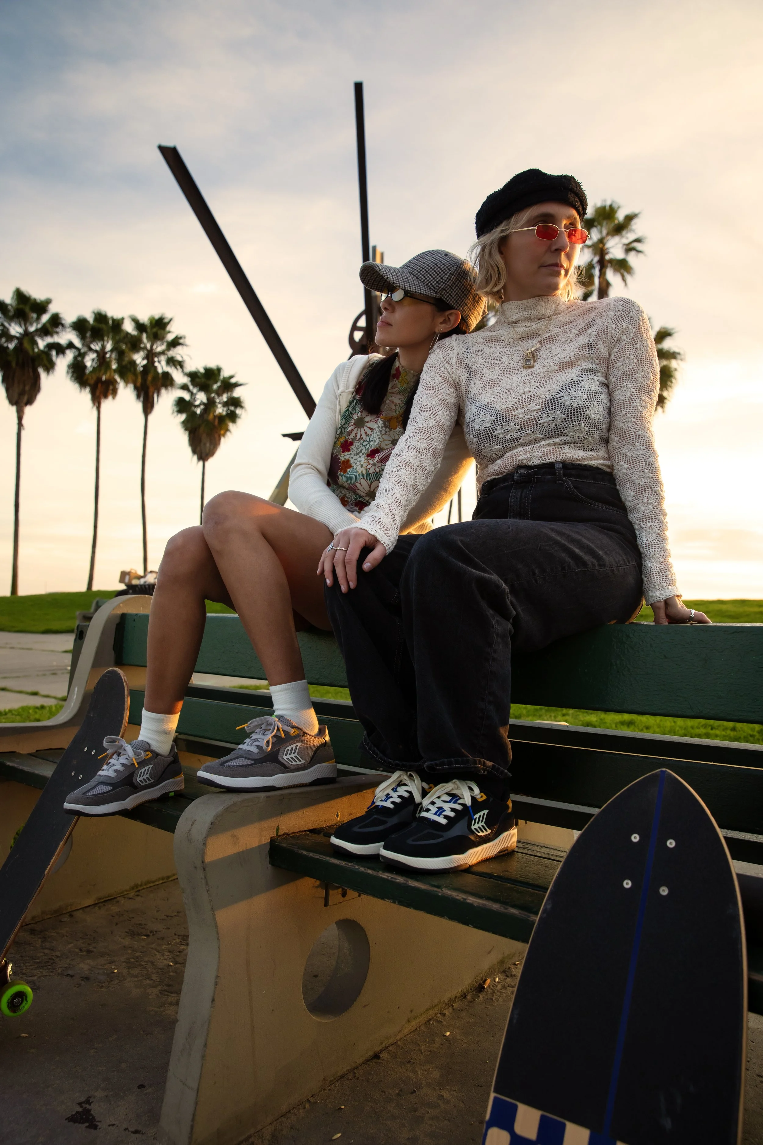 Lindsey & Myriah wearing C25s on bench portrait.JPG
