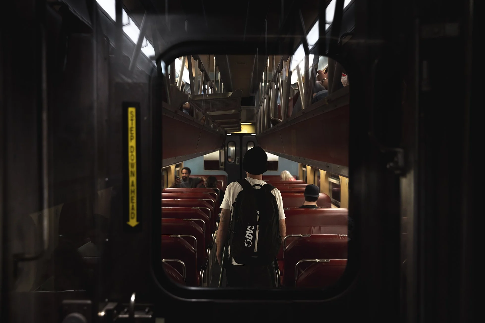 CANON_20260417_TYLER WALKING THROUGH TRAIN CAR.jpg