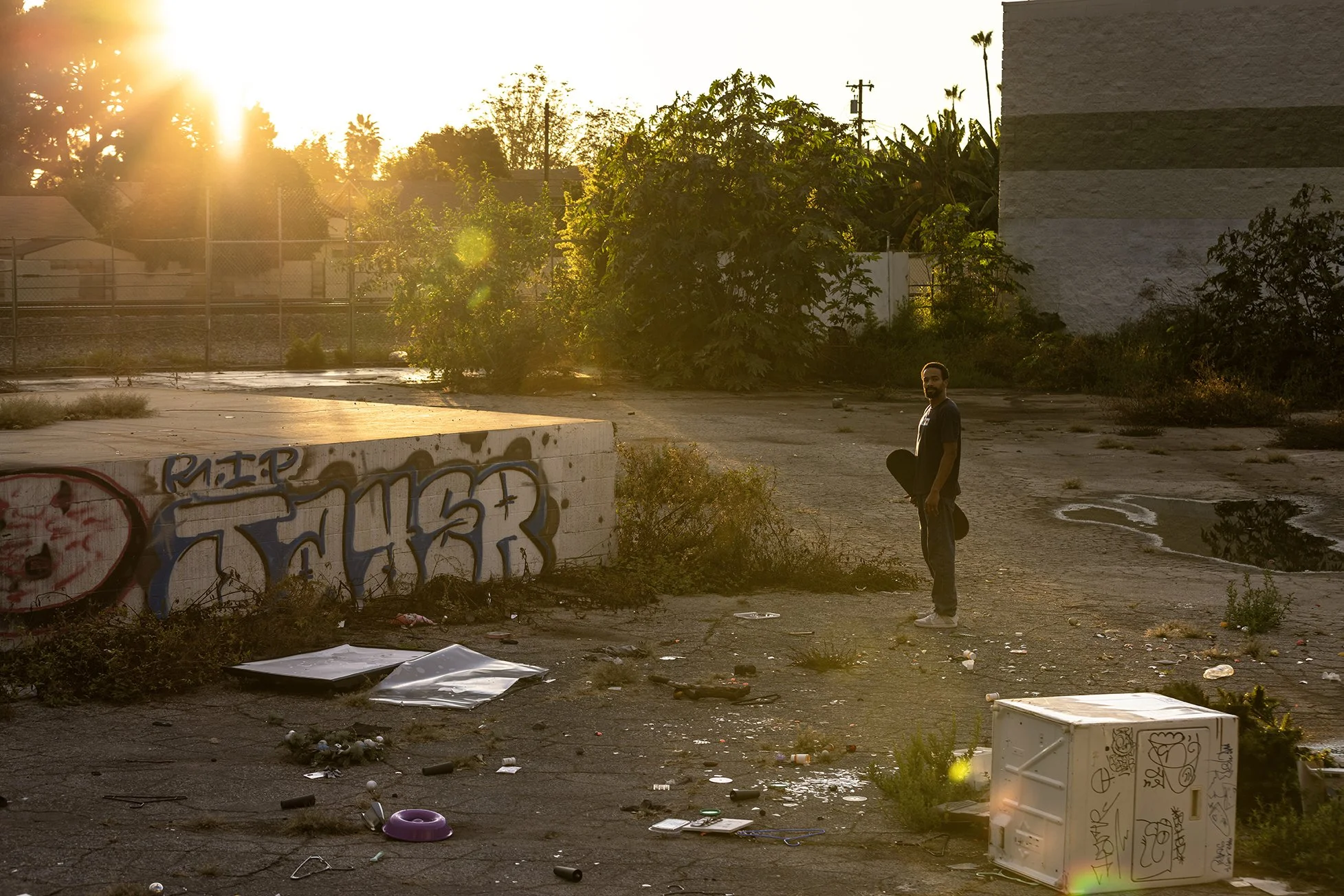 Timmy standing in abandoned field at foundation spot portrait.jpg