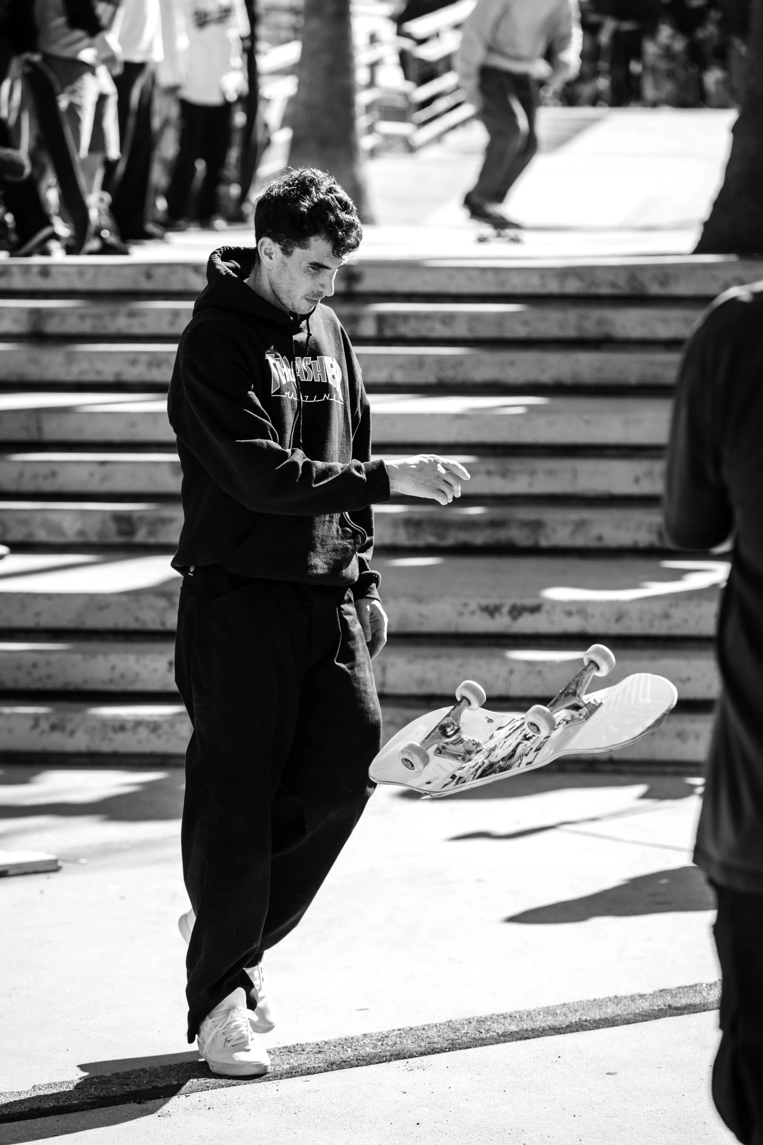 Franky Spears throwing his board bts portrait.JPG