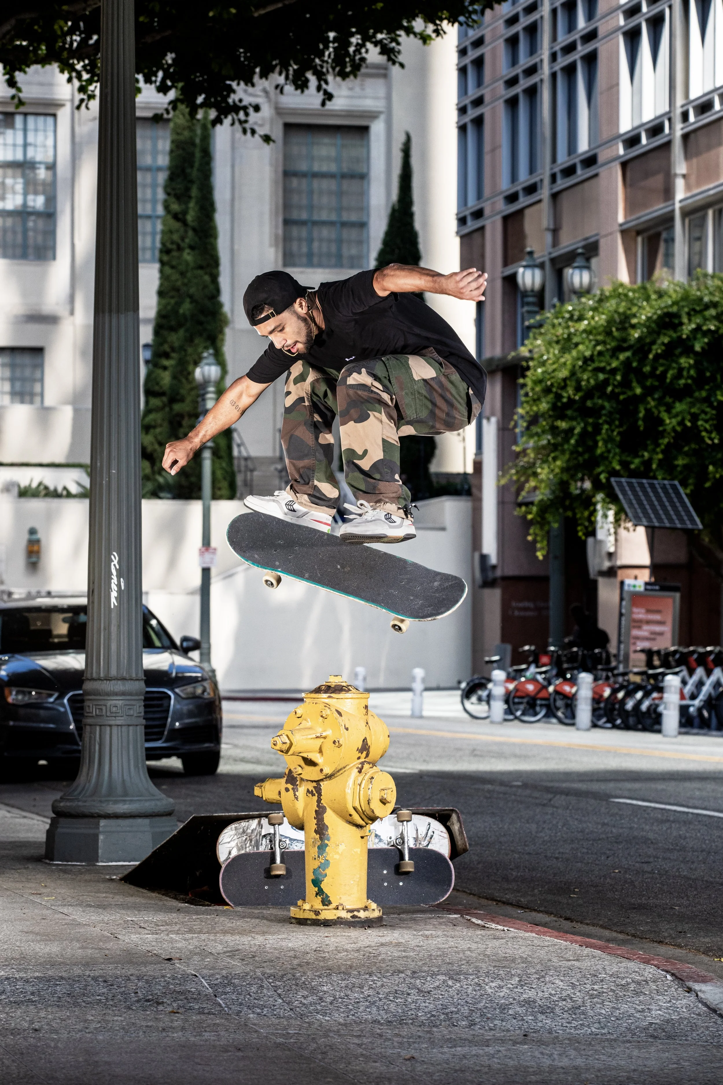 Deon tre flip bump over hydrant 1.JPG