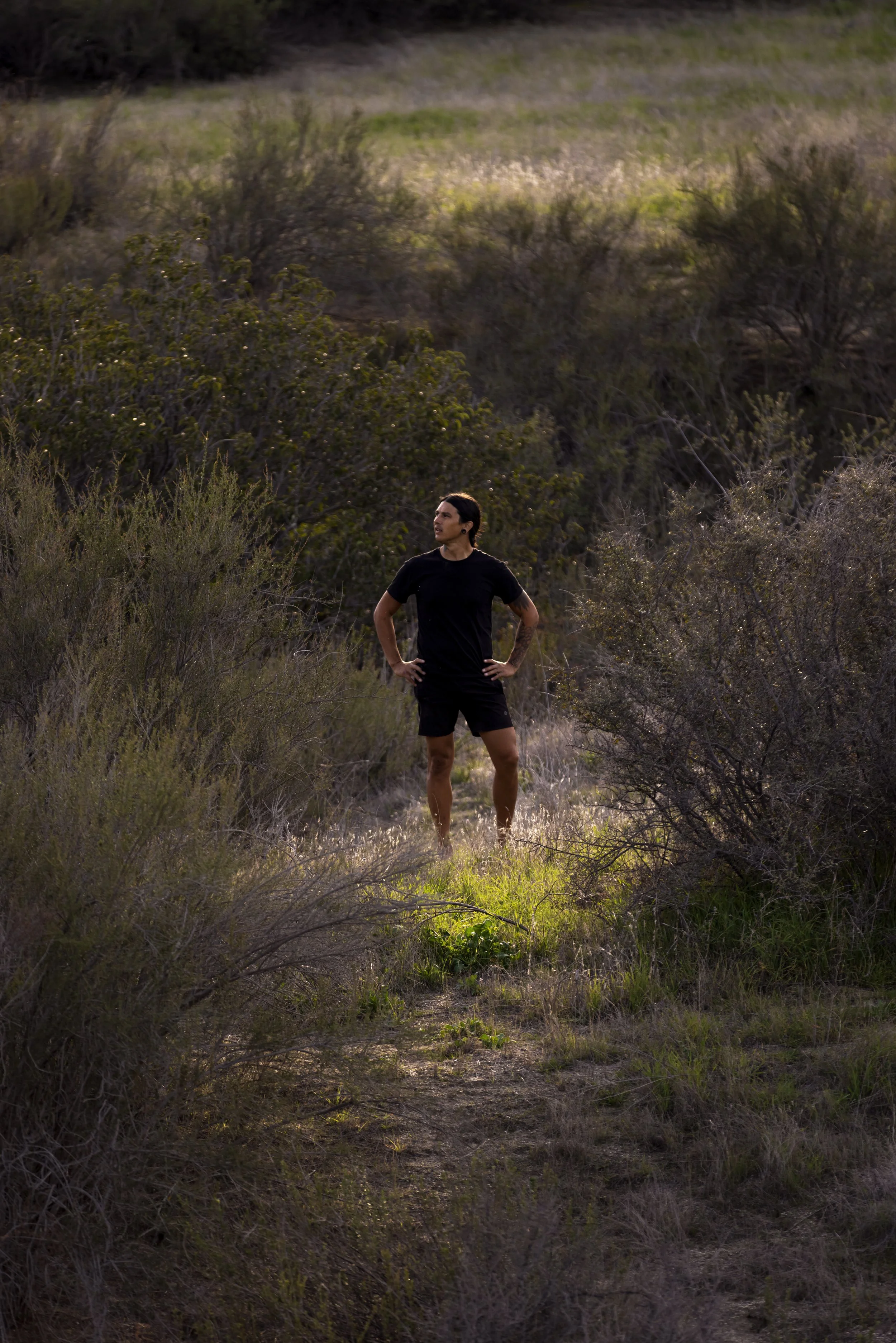Ricky standing on ravine trail.JPG