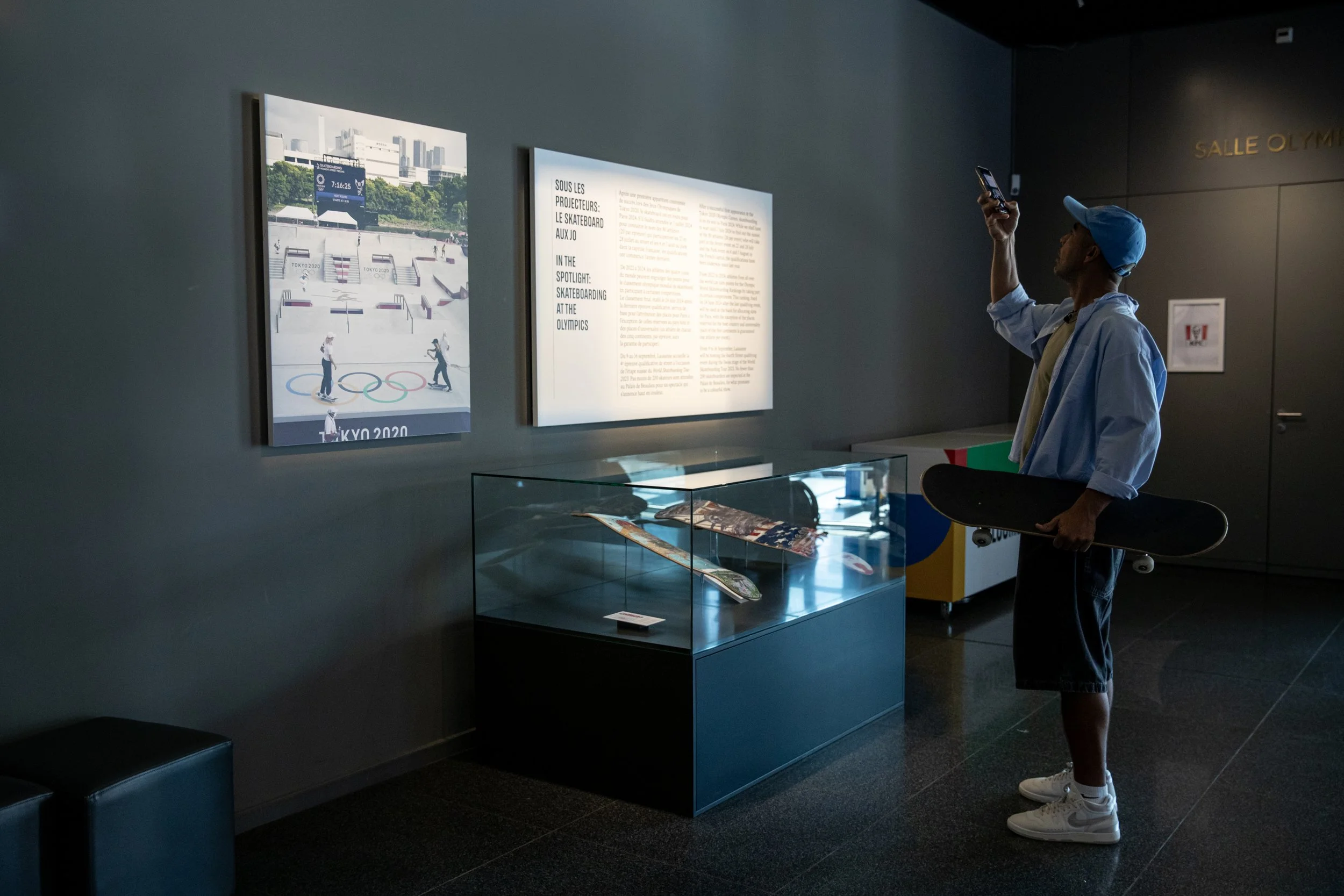 Koston looking at board display exhibit 2.JPG
