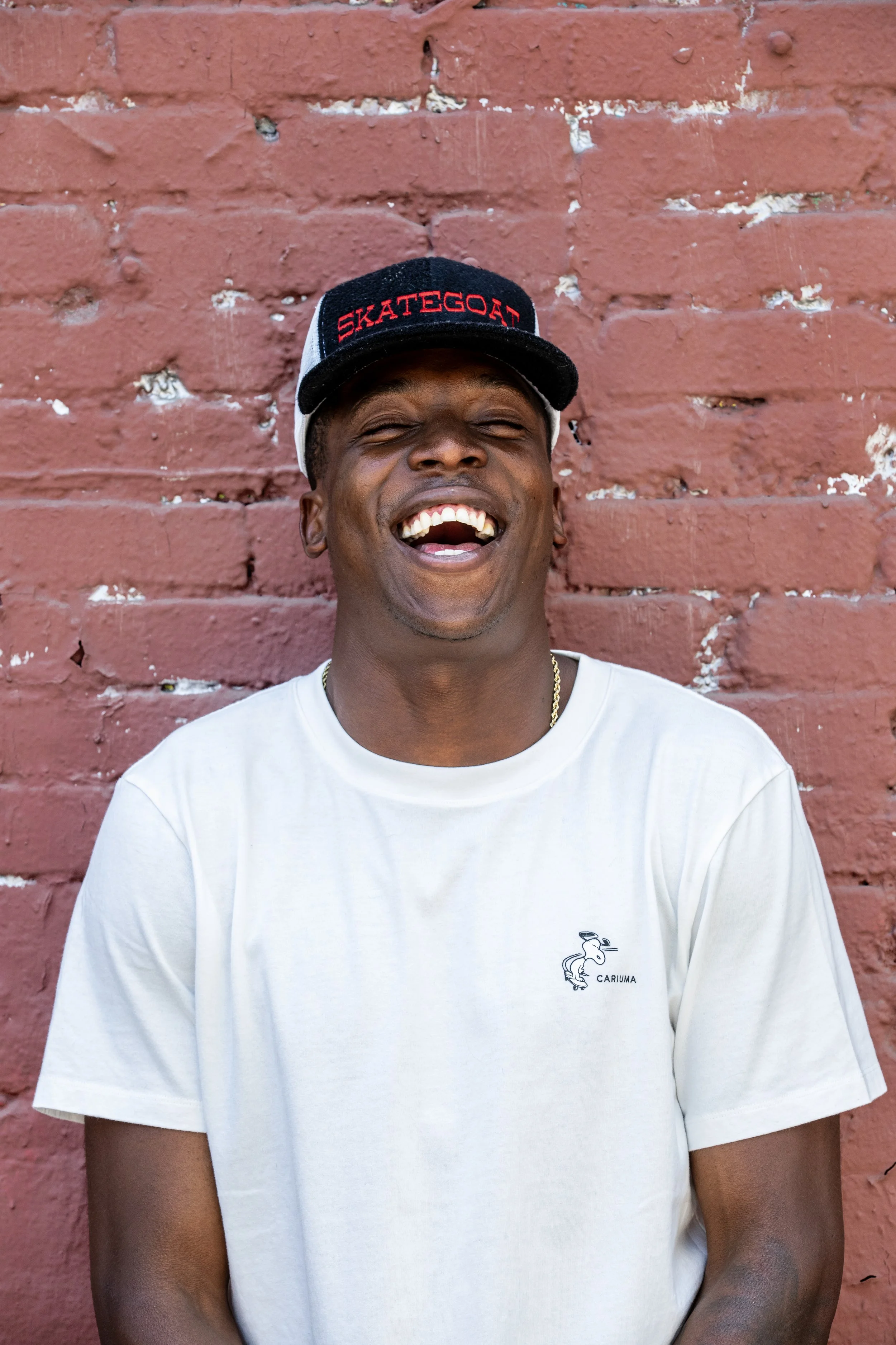 LeAndre wearing white Snoopy shirt portrait front 3.JPG