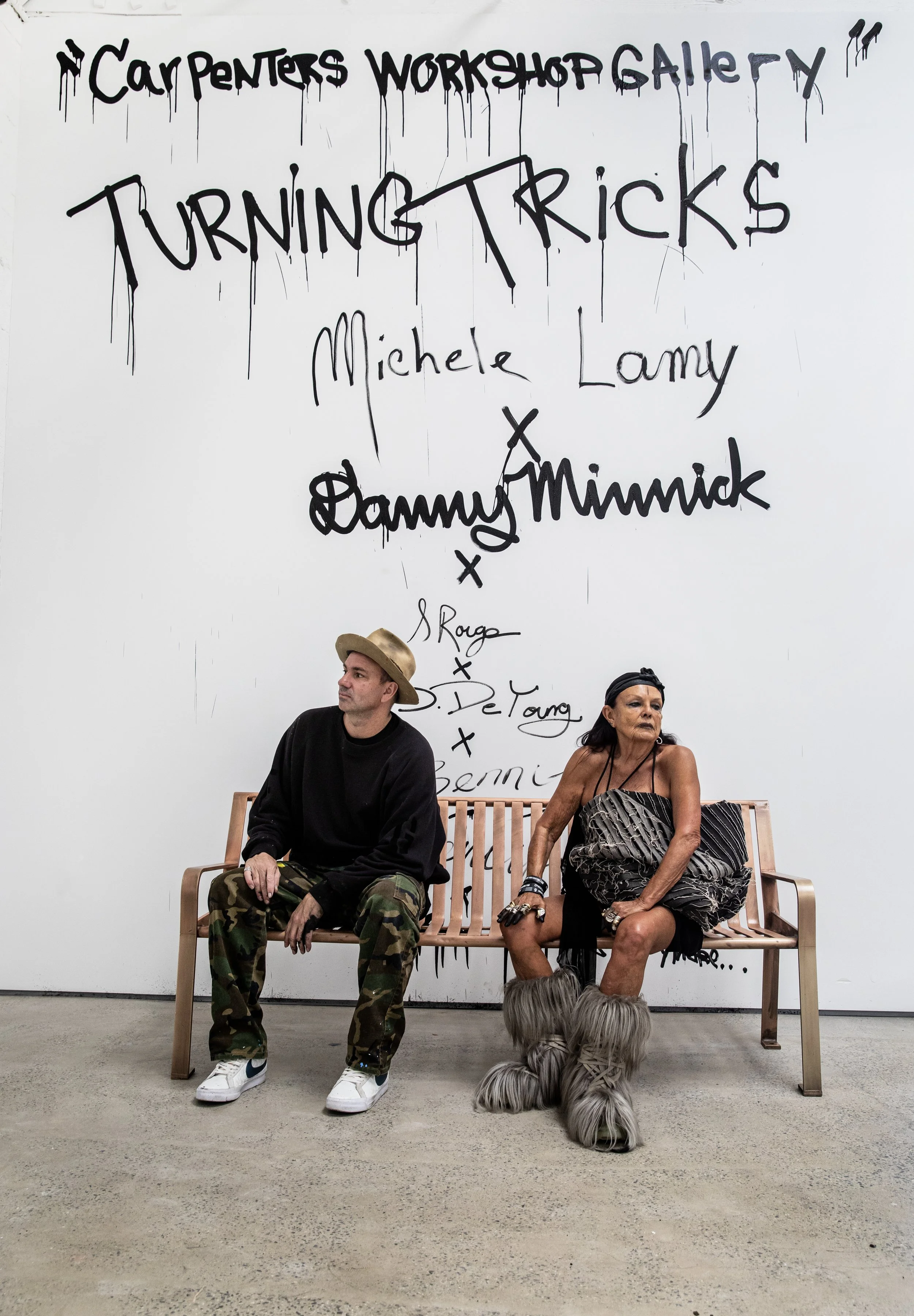 Danny & Michelle sitting on bench portrait 1.JPG