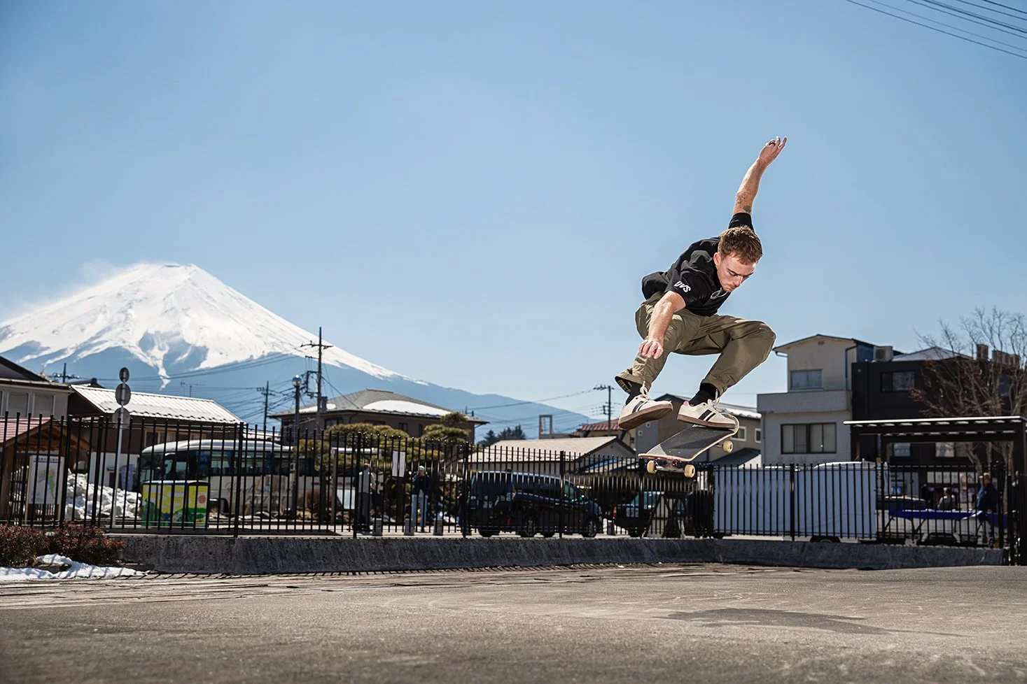 Tyler kickflip next to train.jpg