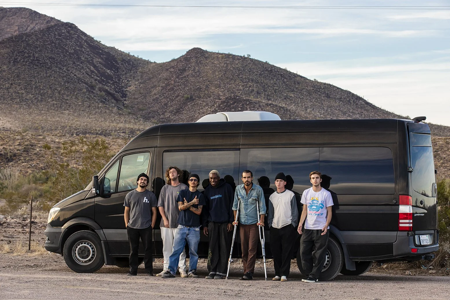 Team photo in front of van in desert 2.jpg