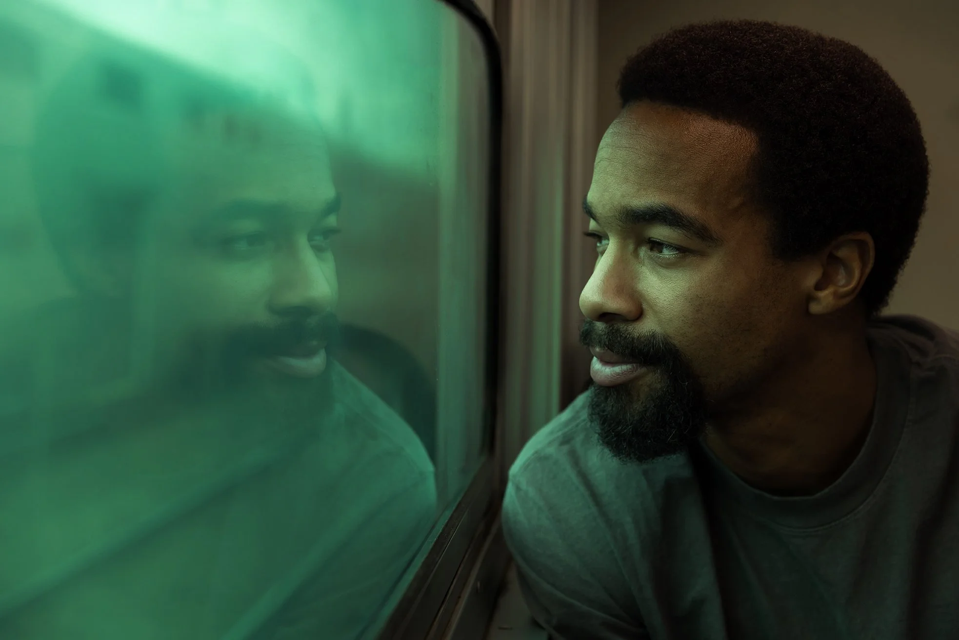 CANON_20260417_TIMMY TRAIN WINDOW REFLECTION PORTRAIT.jpg
