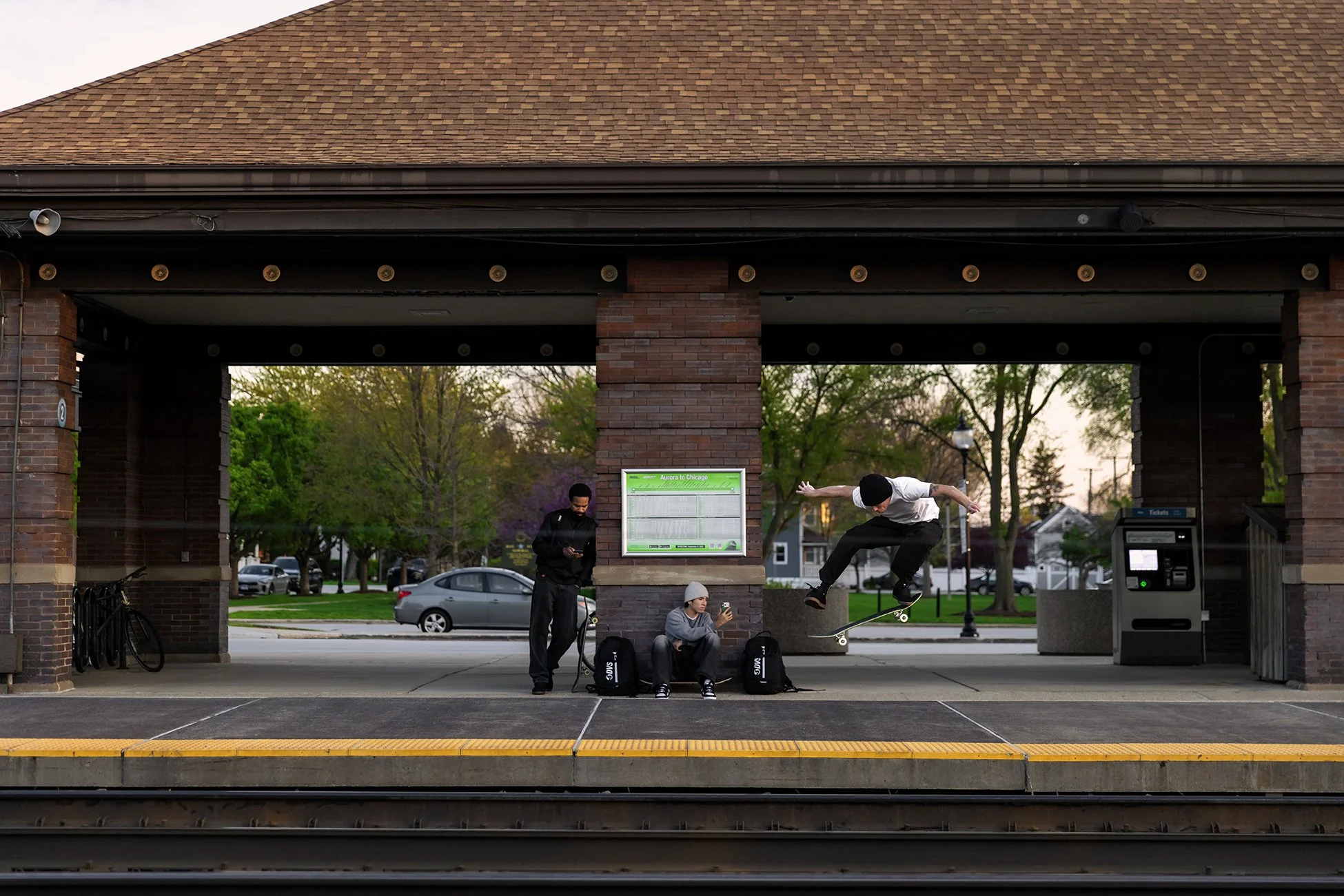 CANON_20260418_TYLER KICKFLIP AT TRAIN STATION.jpg