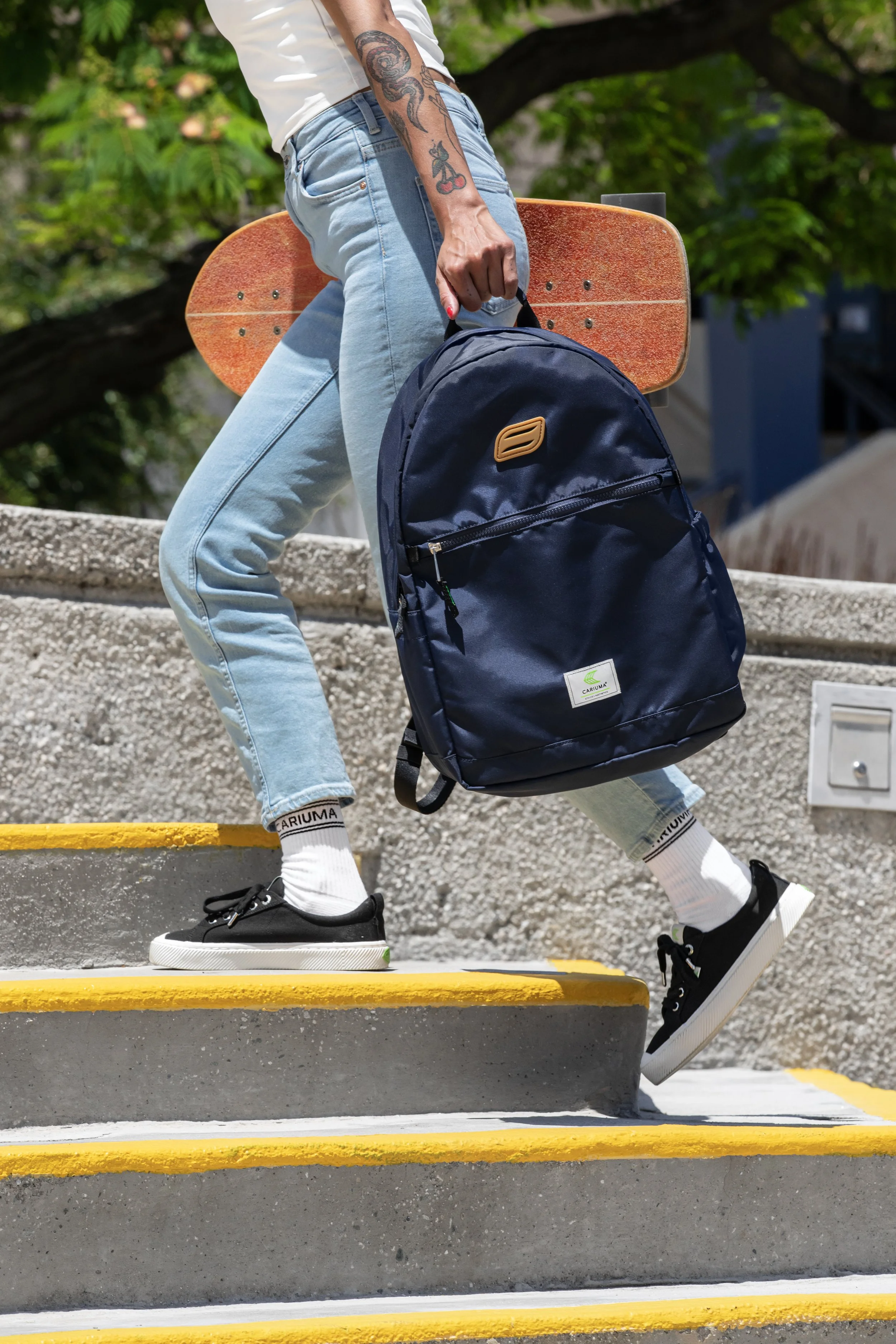 Myriah holding backpack product photo.JPG