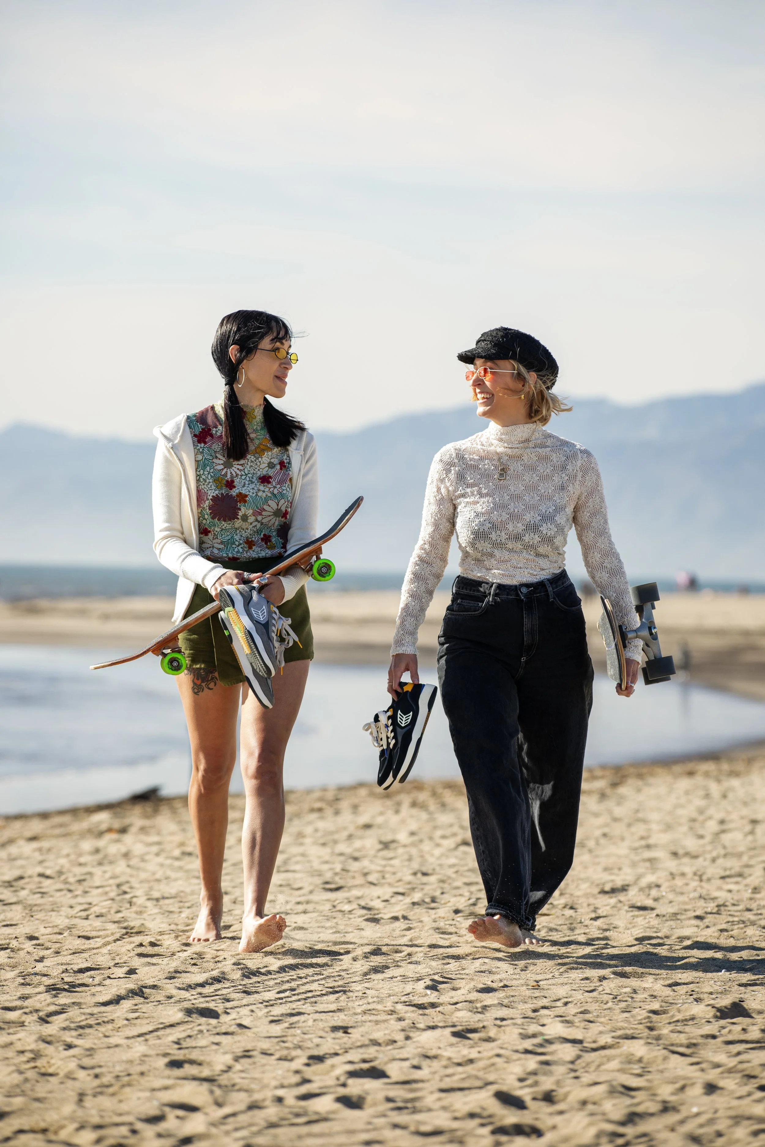 Lindsey & Myriah walking on beach with C25 shoes portrait.JPG
