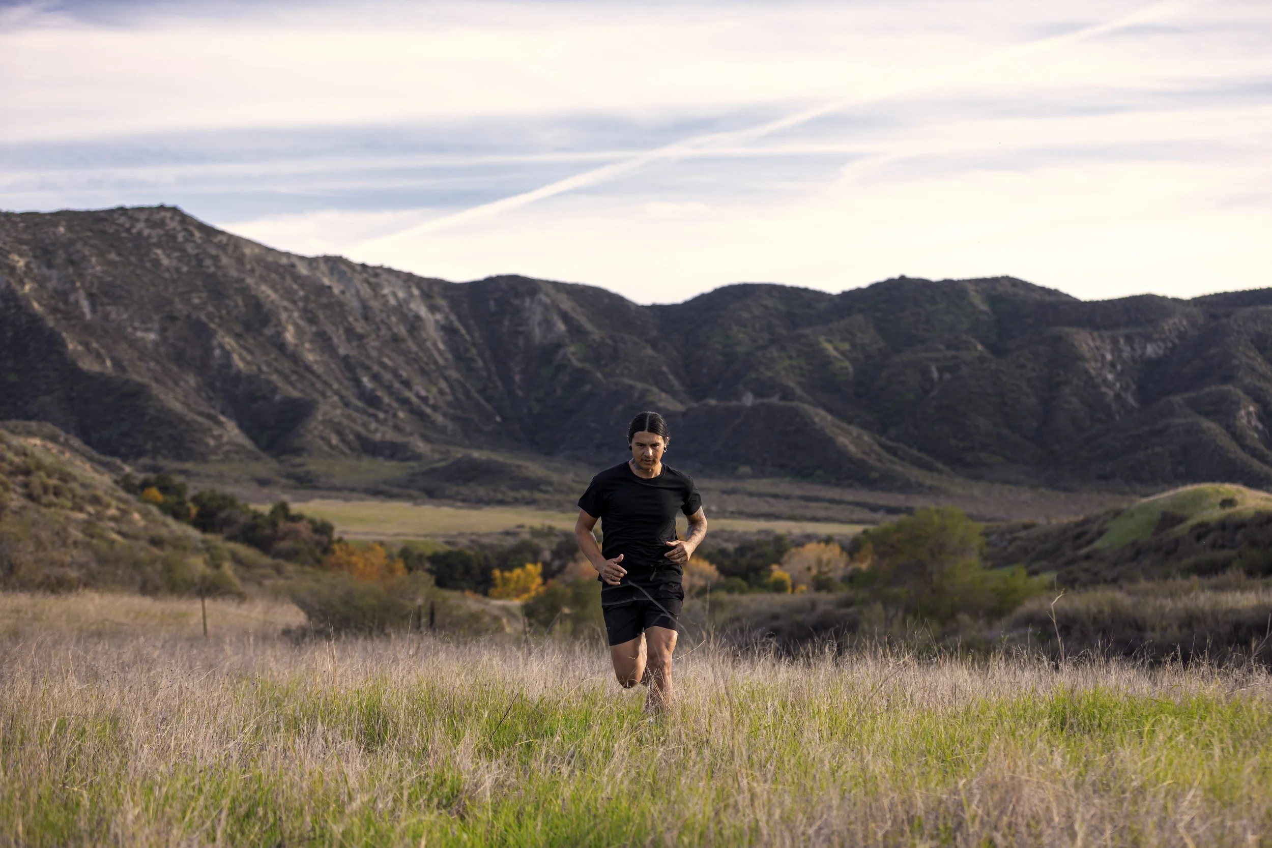 Ricky running through ravine trail 3.JPG