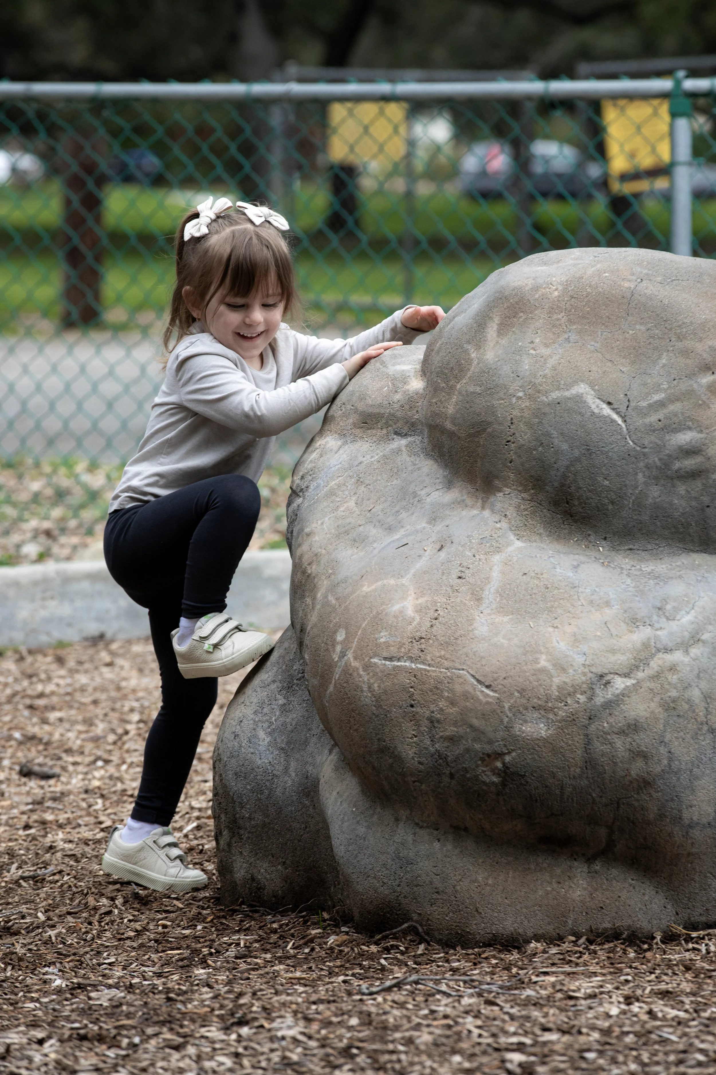 Emy playing on playground 2.JPG