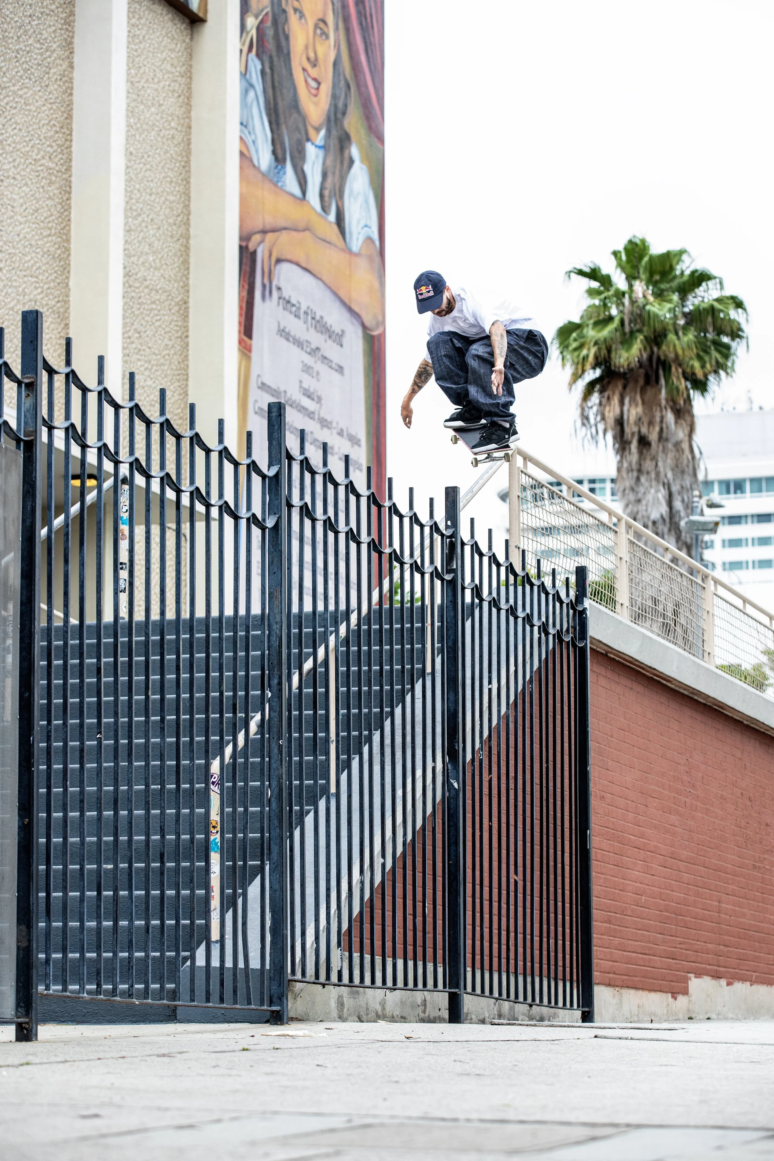 TJ ollie over fence at Hollywood 16 2.JPG