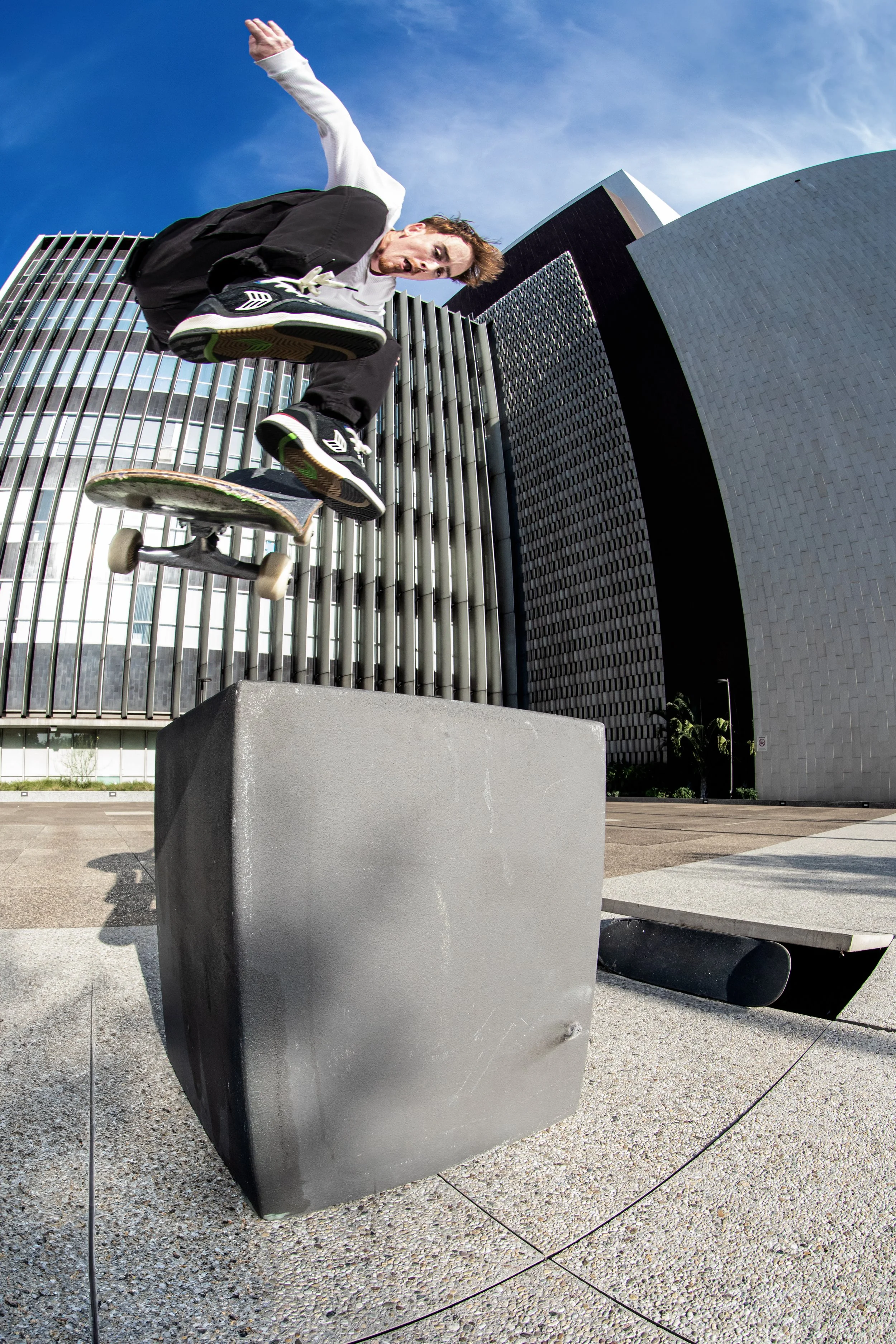 Tyler bs flip bump over trashcan 3.JPG