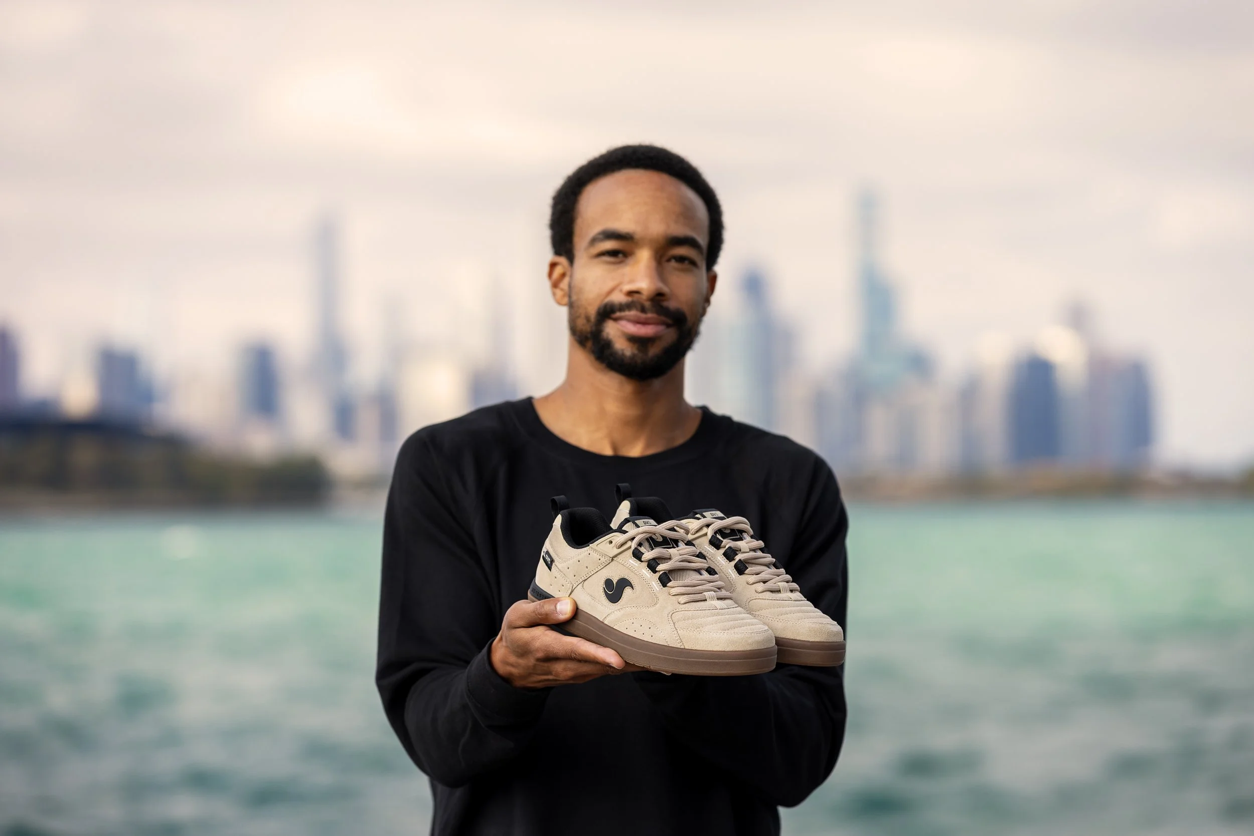 Timmy holding sand:gum sureshock shoes portrait.JPG