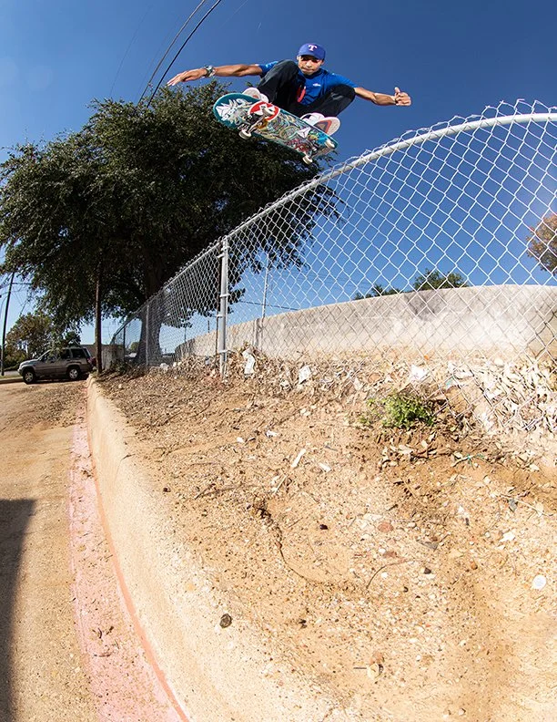 Kechaud kickflip over fence.jpg