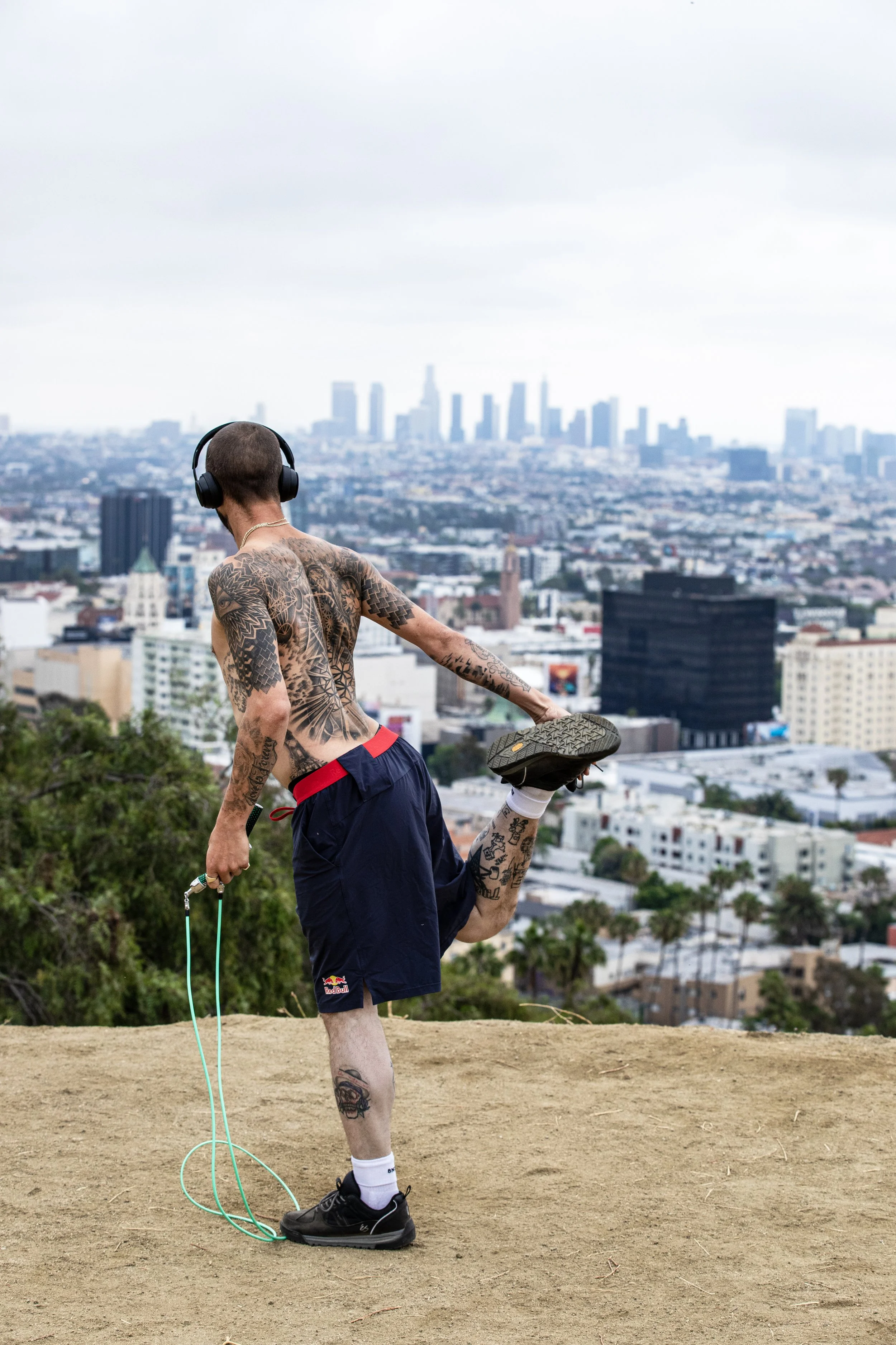 TJ stretching in front of LA skyline 3.JPG