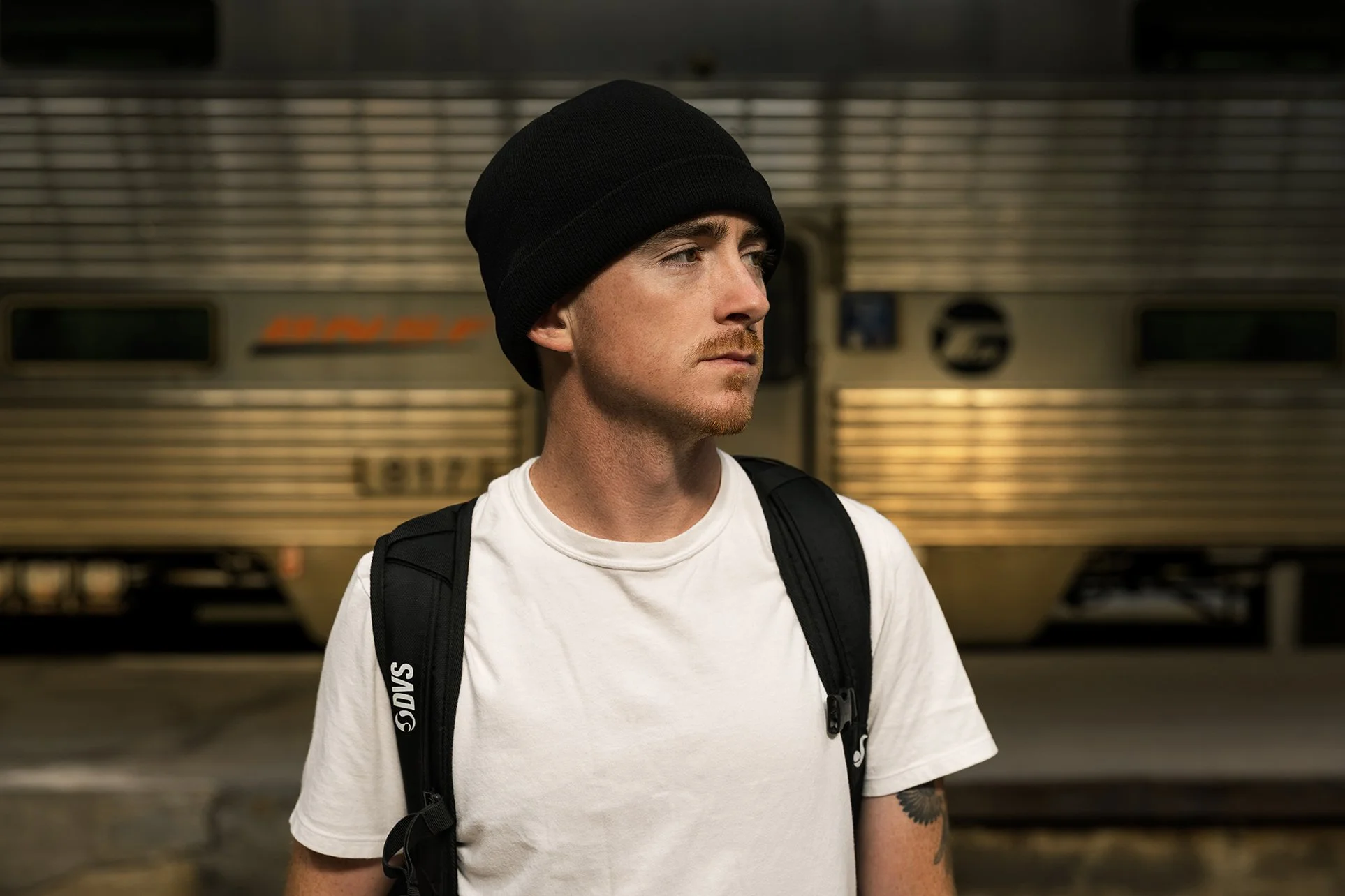 CANON_20260417_TYLER PORTRAIT IN FRONT OF TRAIN.jpg