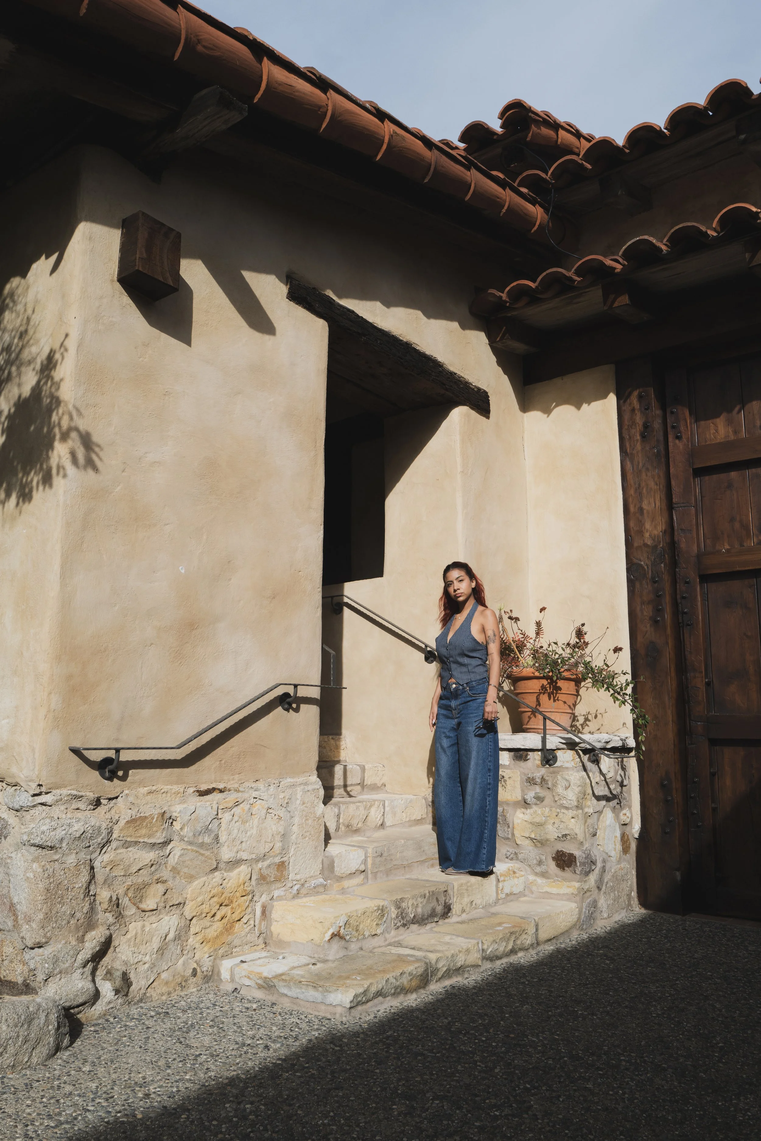 Karissa portrait on stairs at Carmel church 2.jpg