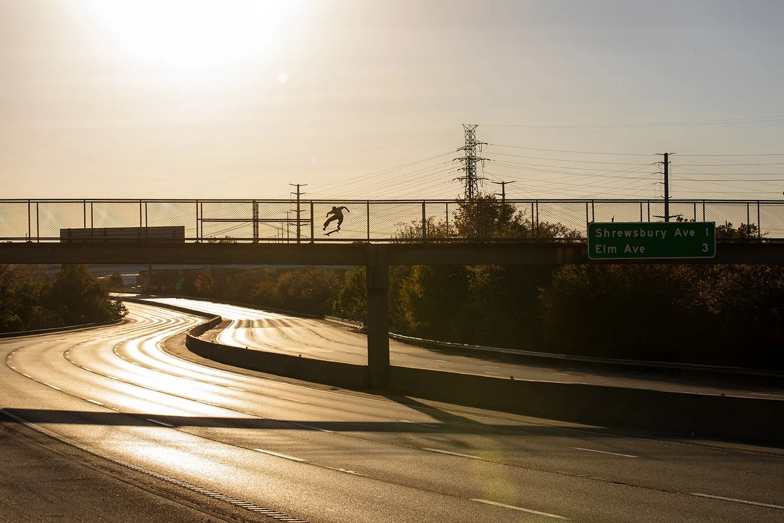 Tyler kickflip on highway overpass (no cars).jpg