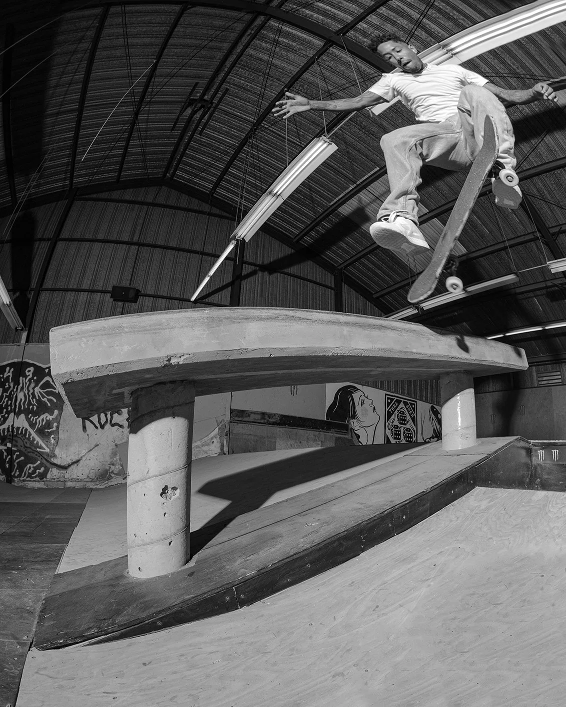 Kwesi tre flip noseslide fisheye doublerock.jpg