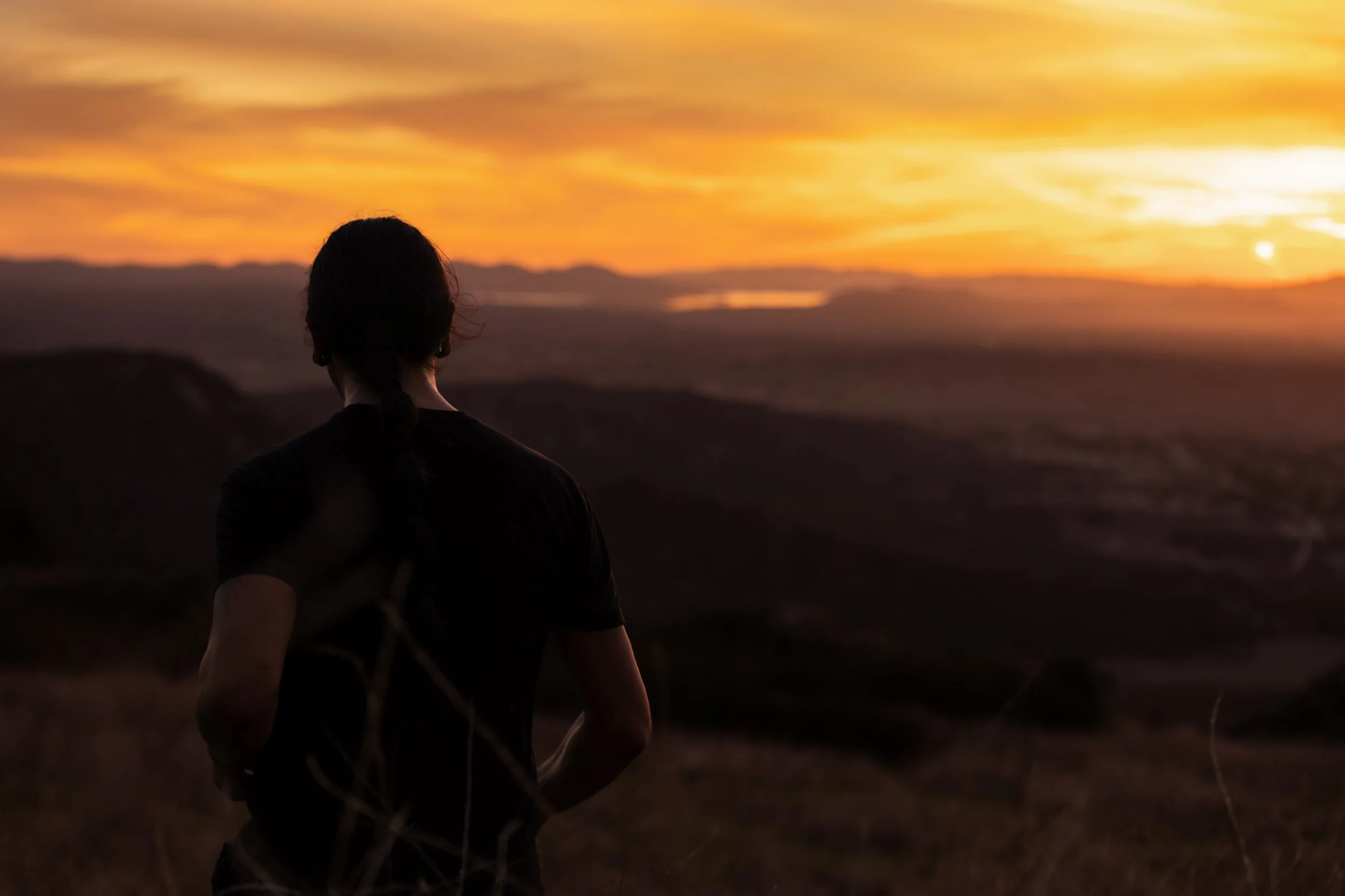 Ricky looking out at reservation at sunset 1.JPG