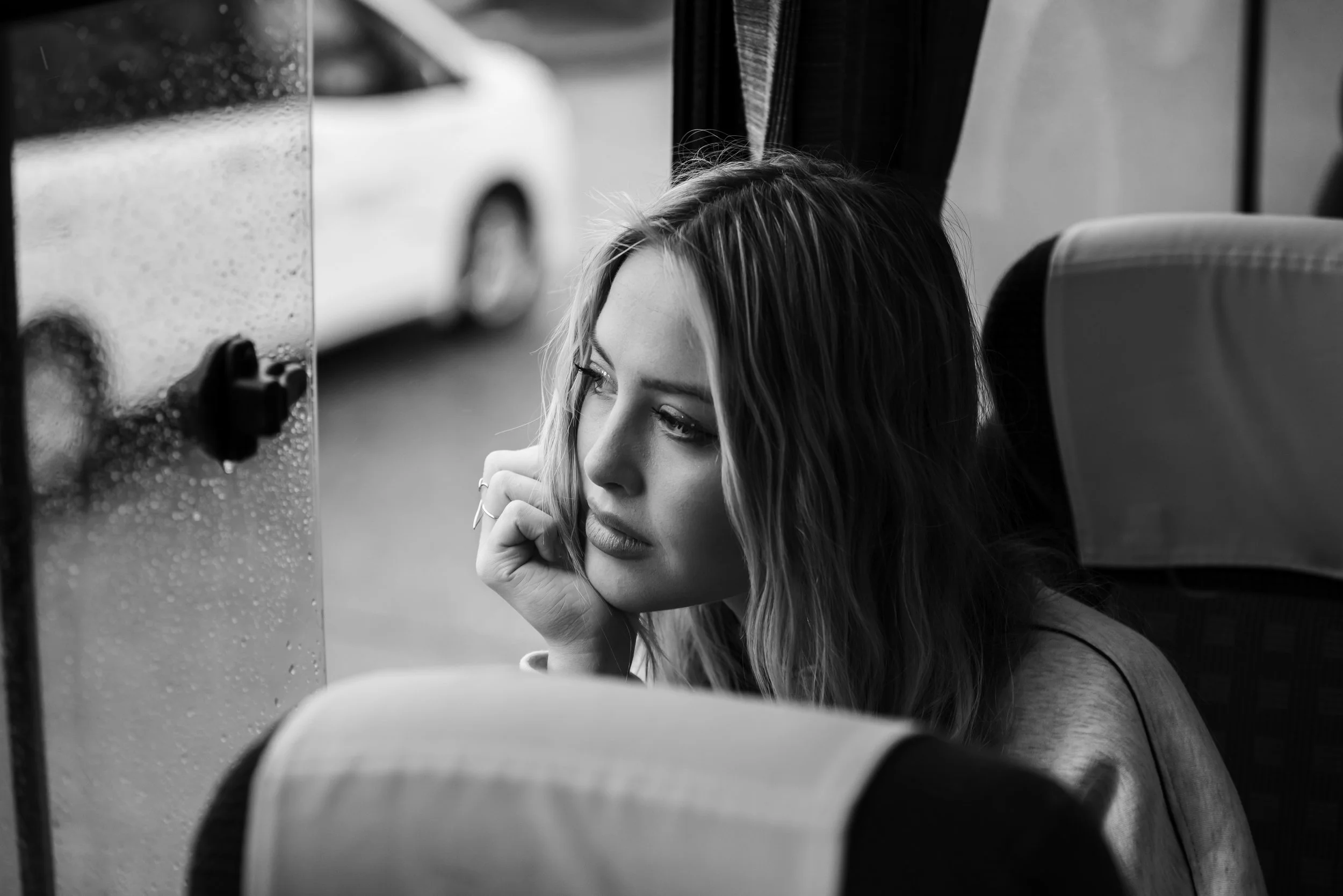 Sterre looking out bus window portrait 2.JPG