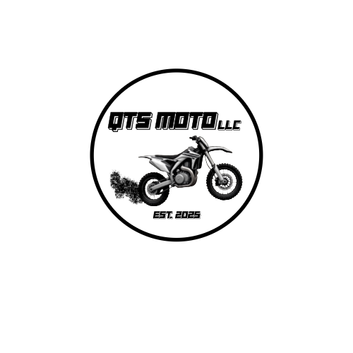A black and white motorcycle on a black background.