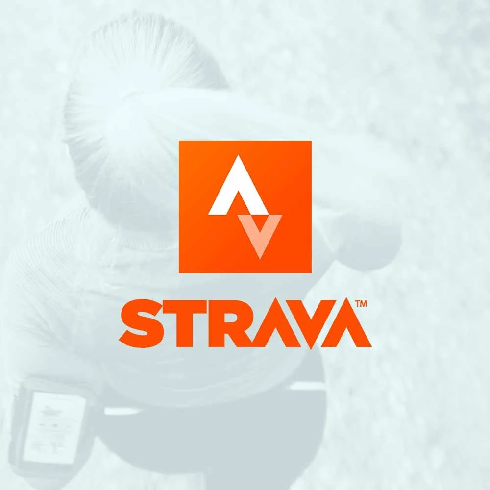 Strava logo with a stylized 'A' in an orange square and the word 'STRAVA' in orange below, over a blurred background of a person running on a trail.