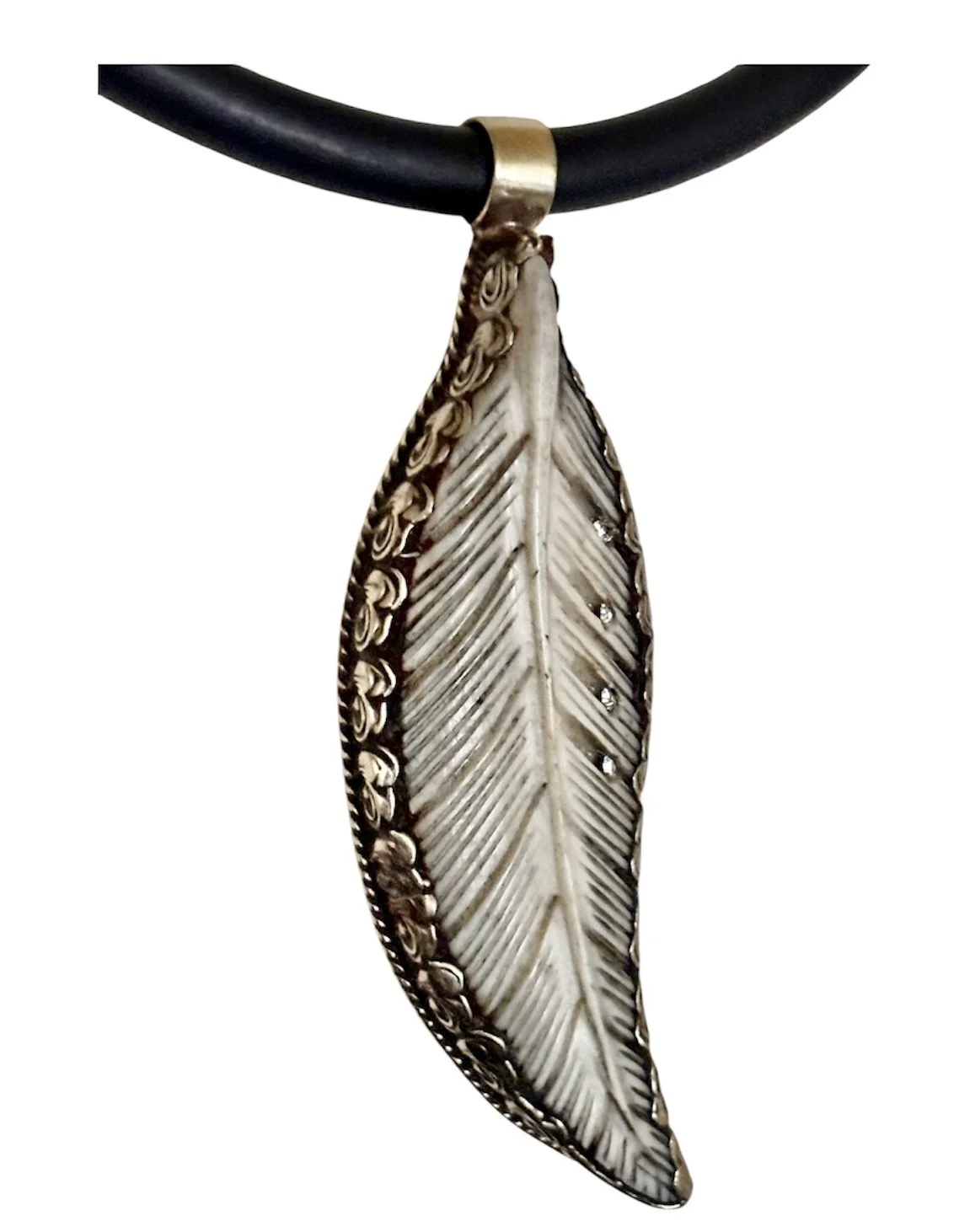 bone feather carved pendant inlaid into silver frame, dimensional floral design with accent, rhinestones pendant  rubber cord, neck, necklace