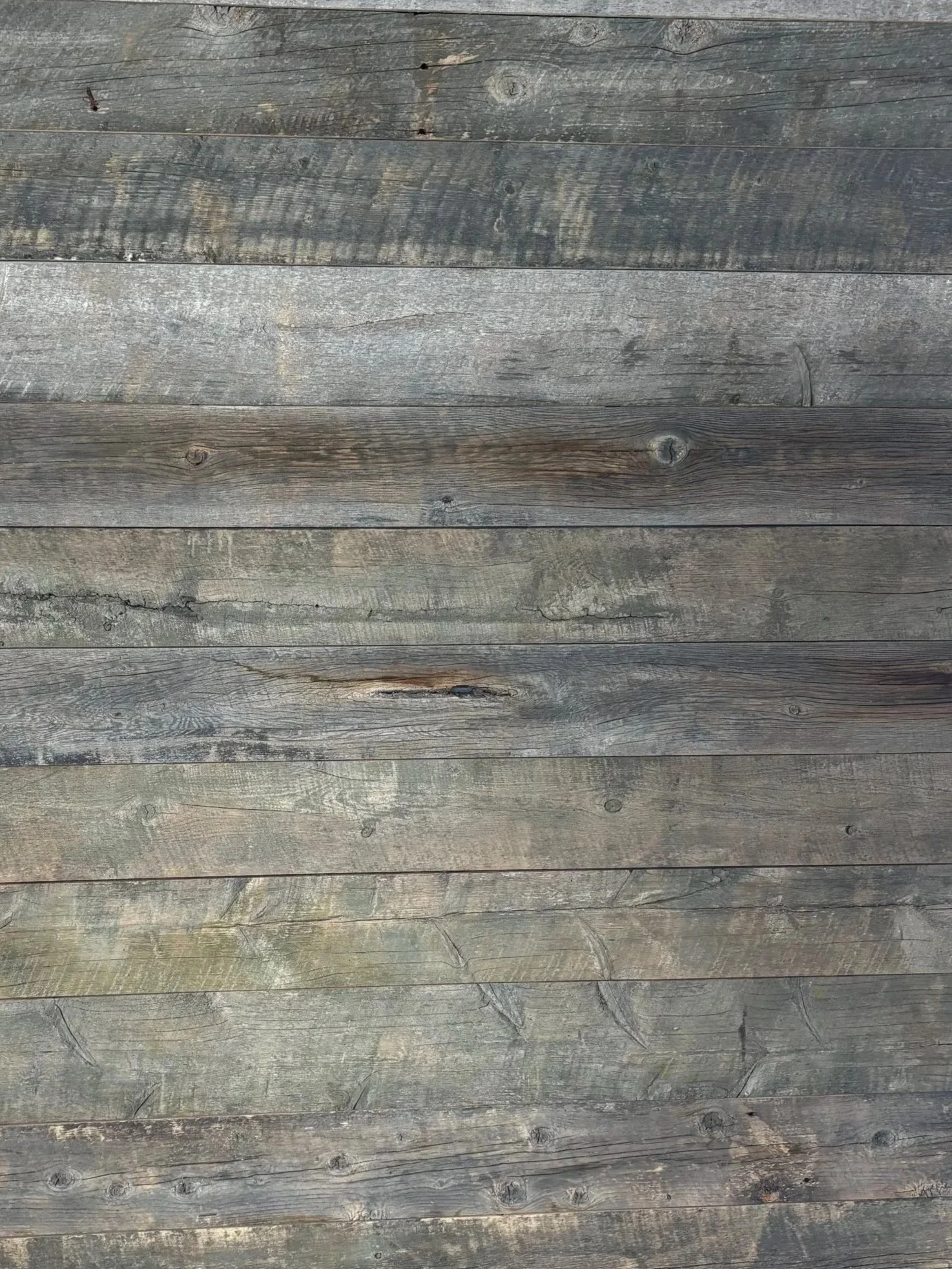 Close-up view of weathered wooden planks.