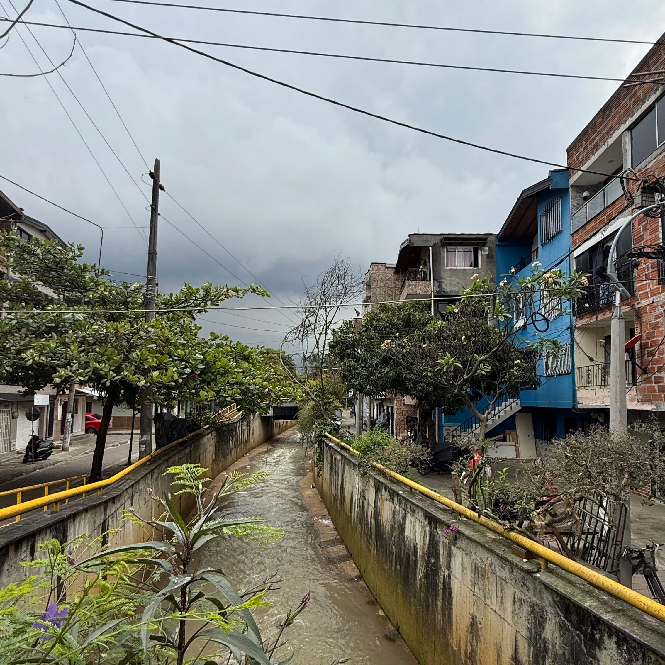 River in Moravia in Comuna 4 on the Barrio Transformation Tour with Real City Tours in Medellin Colombia