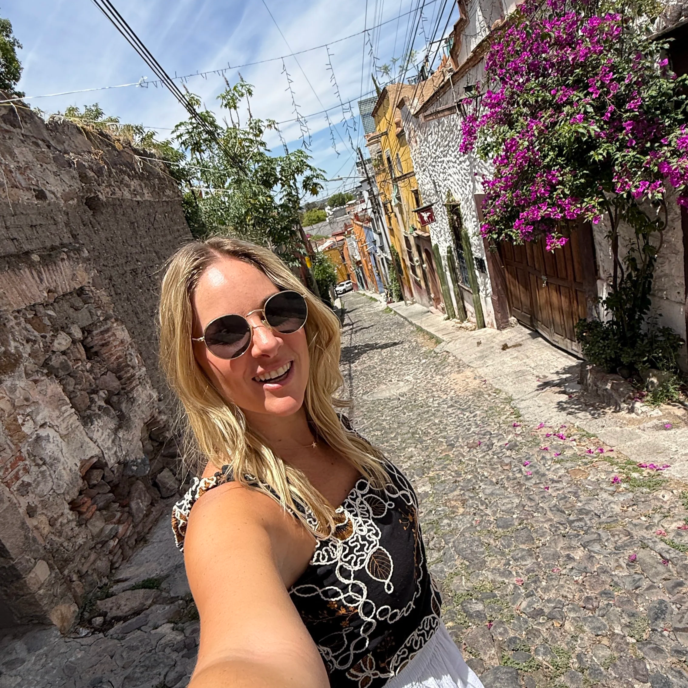 Megan on a cobblestone street in San Miguel de Allende, Mexico